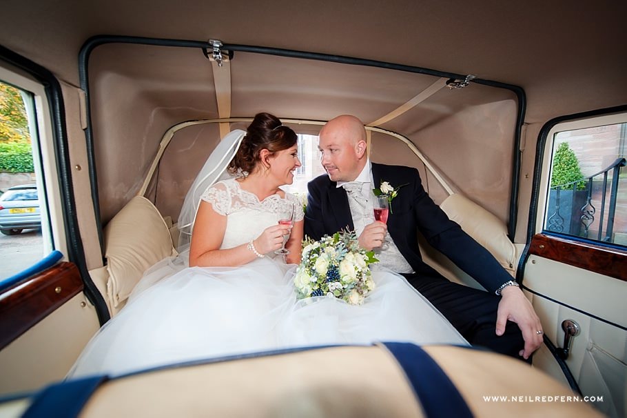 Bride and groom in wedding car Bride and groom in wedding car