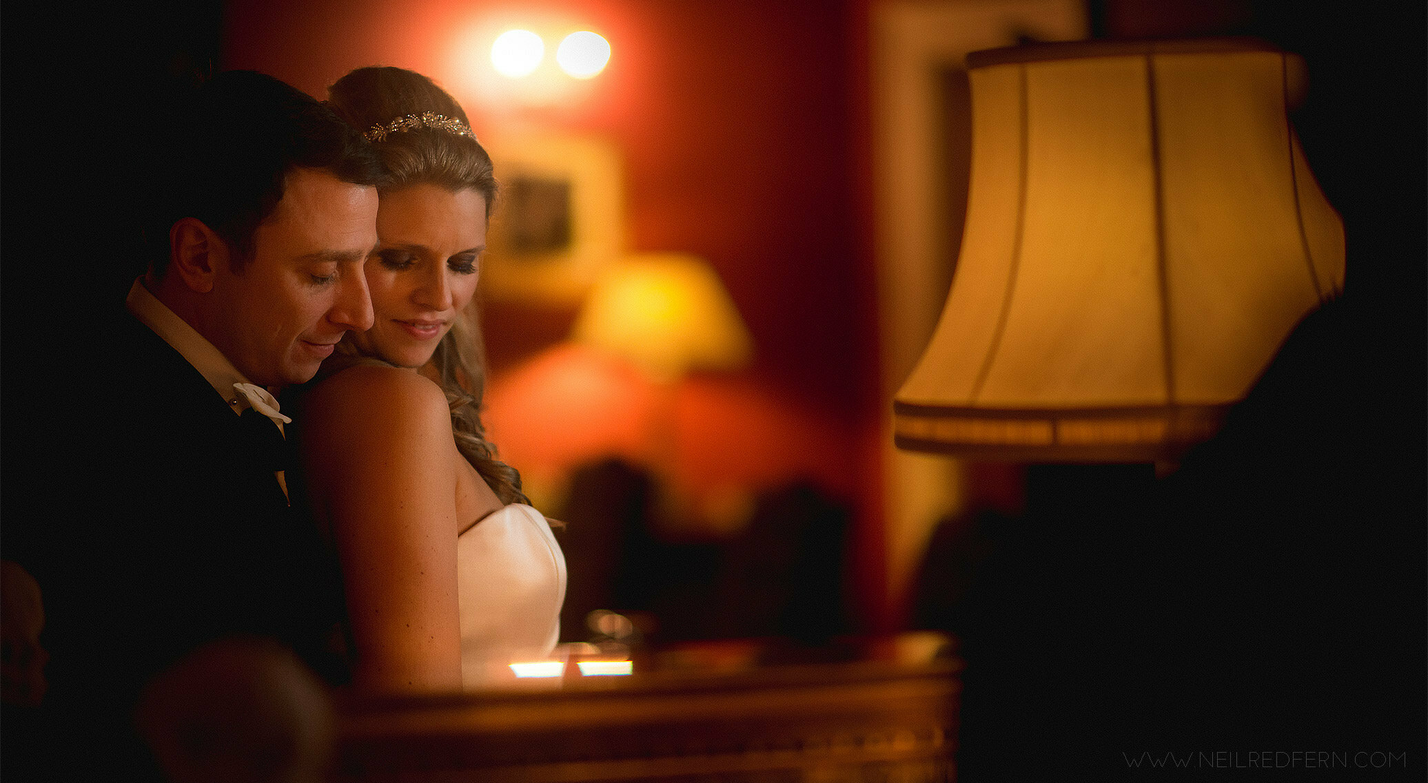 reflection of bride and groom in mirror