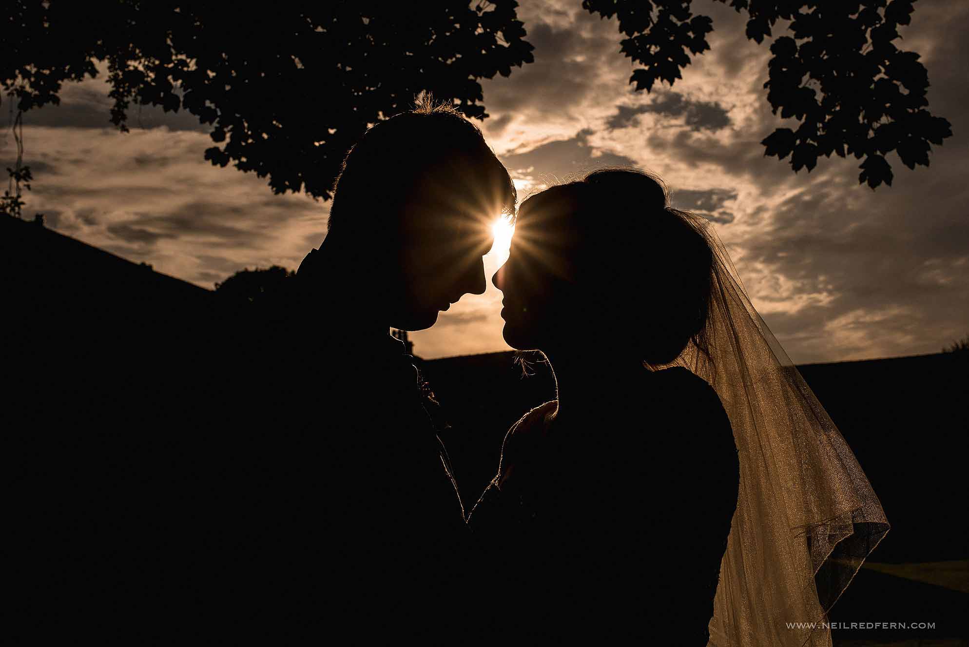 sunset photograph of bride and groom