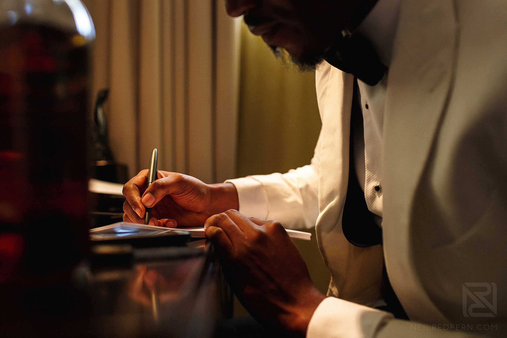 groom writing letter to bride