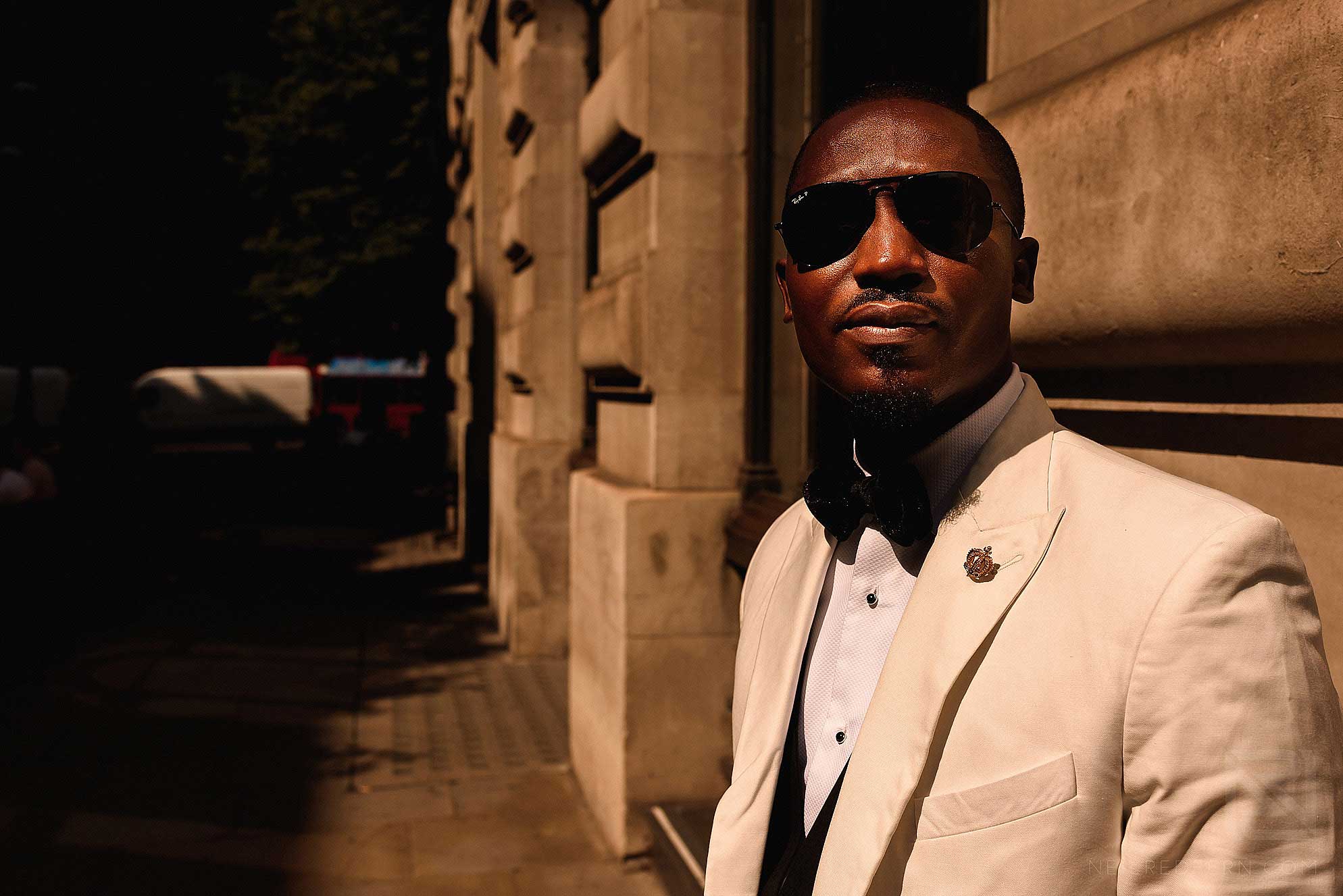 Groom outside The Royal Exchange London