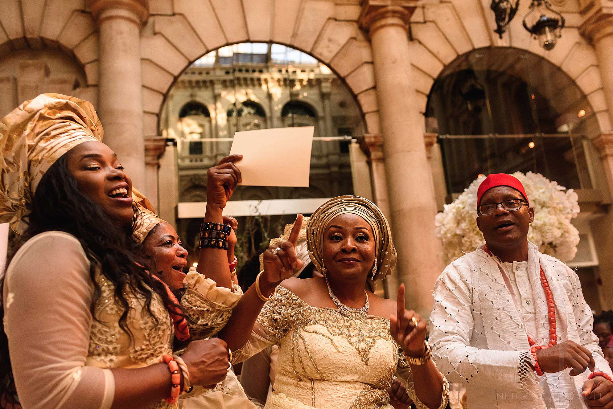 Nigerian wedding party dancing