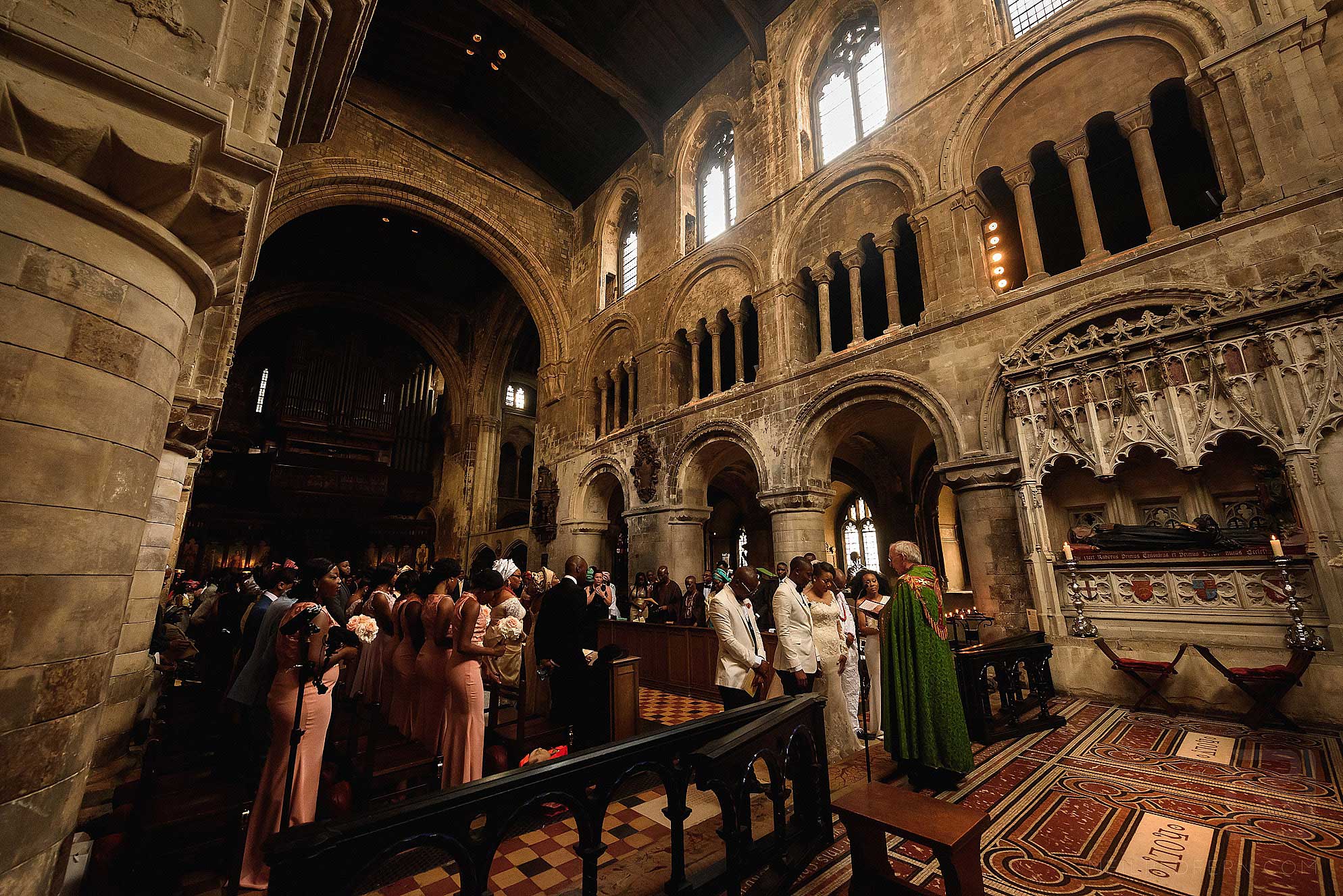 wedding ceremony at St Bartholomew the Great church in London