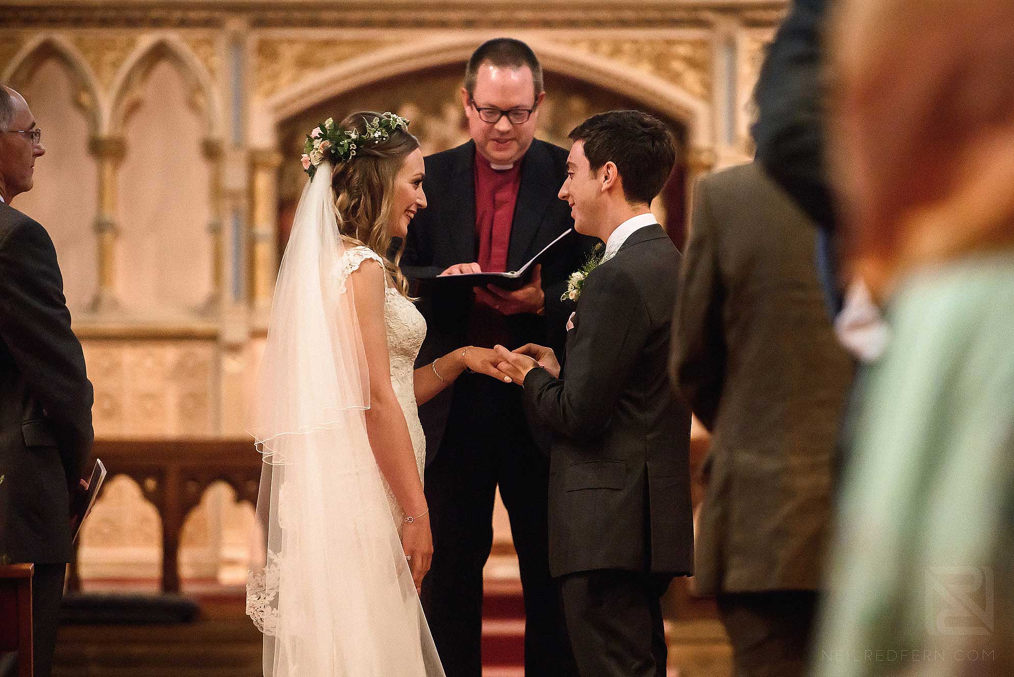 Abbeywood Estate wedding photography 10 bride and groom exchanging vows in church