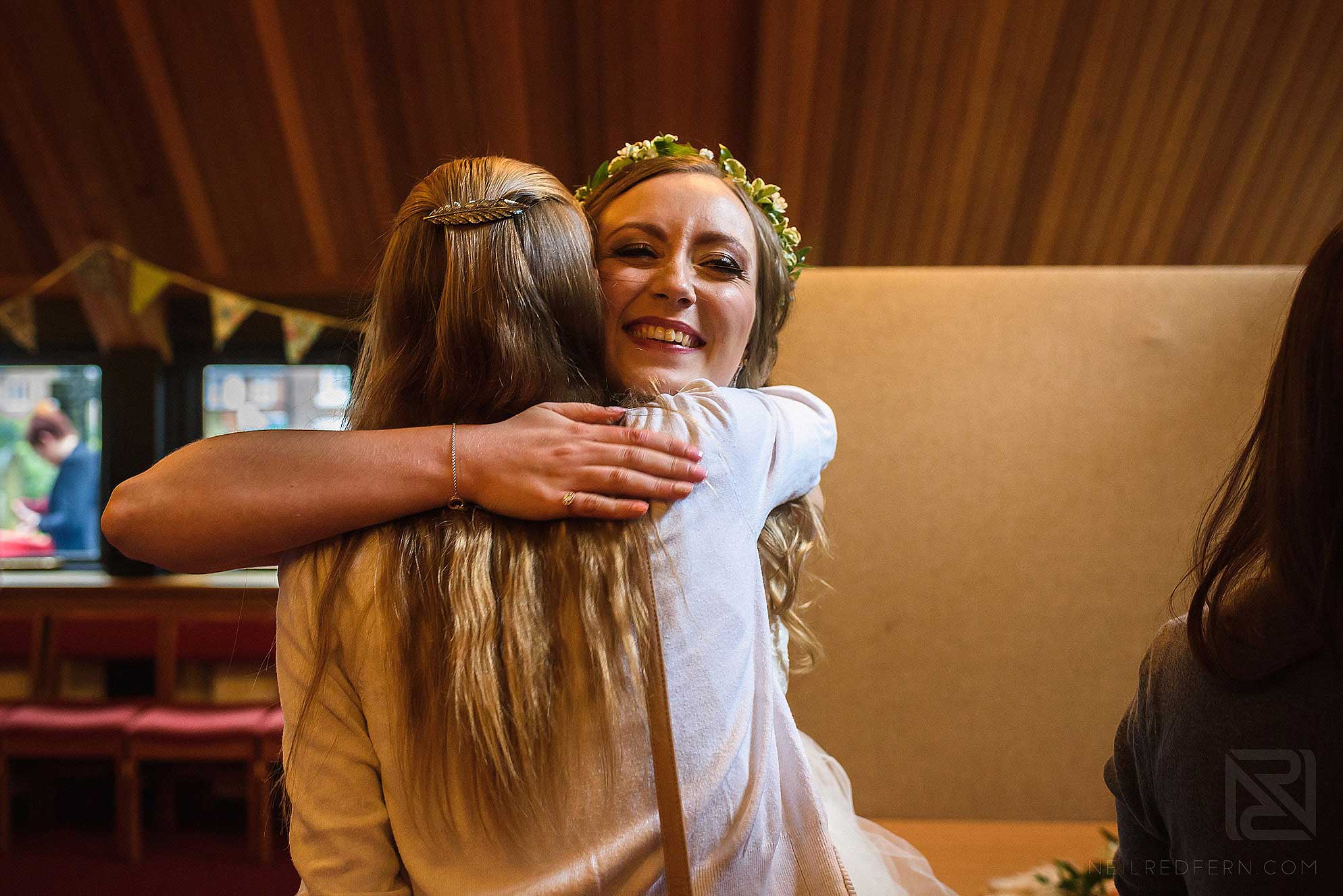 Abbeywood Estate wedding photography 12 bride hugging a friend