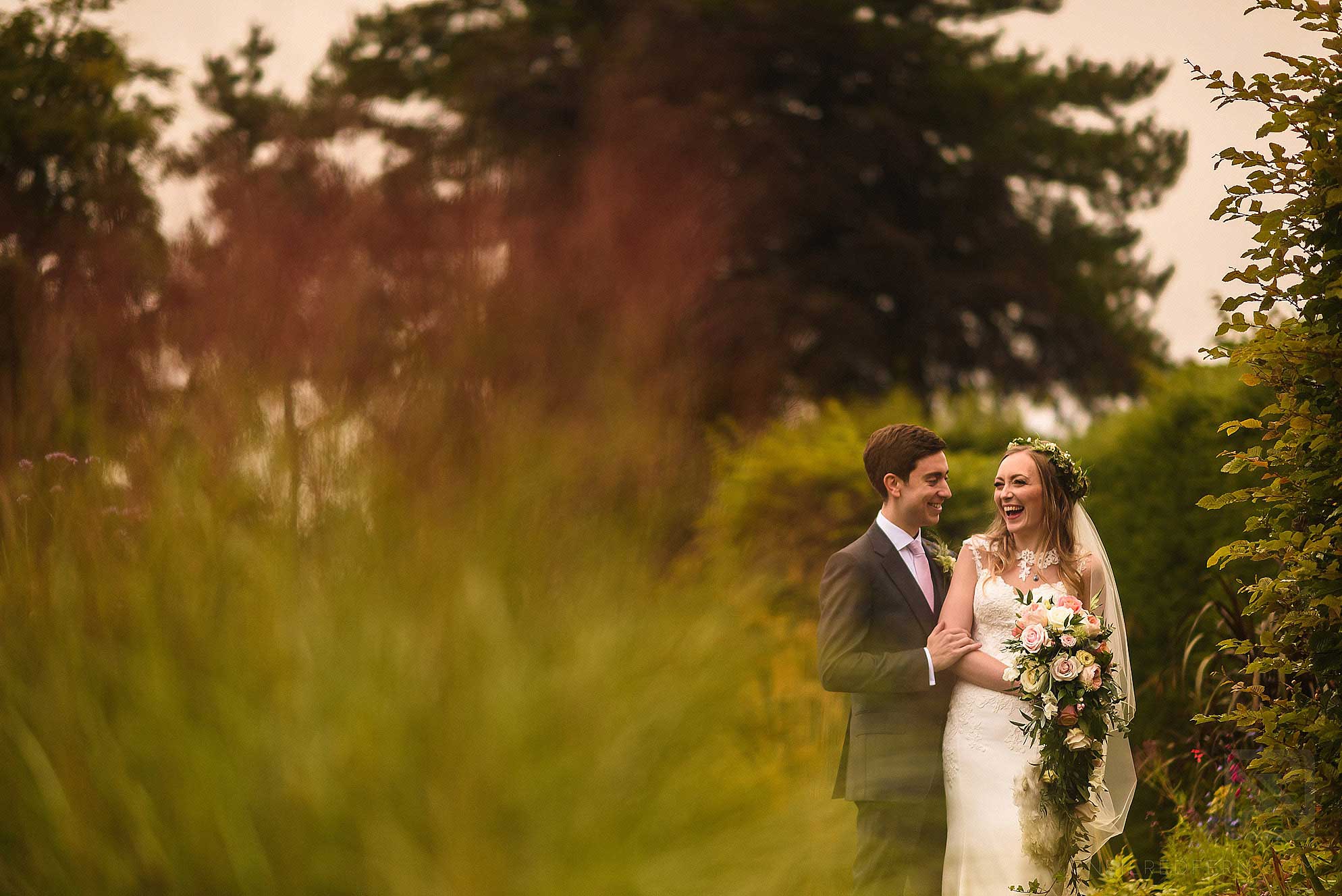 Abbeywood Estate wedding photography 15 bride and groom laughing in Abbeywood Estate