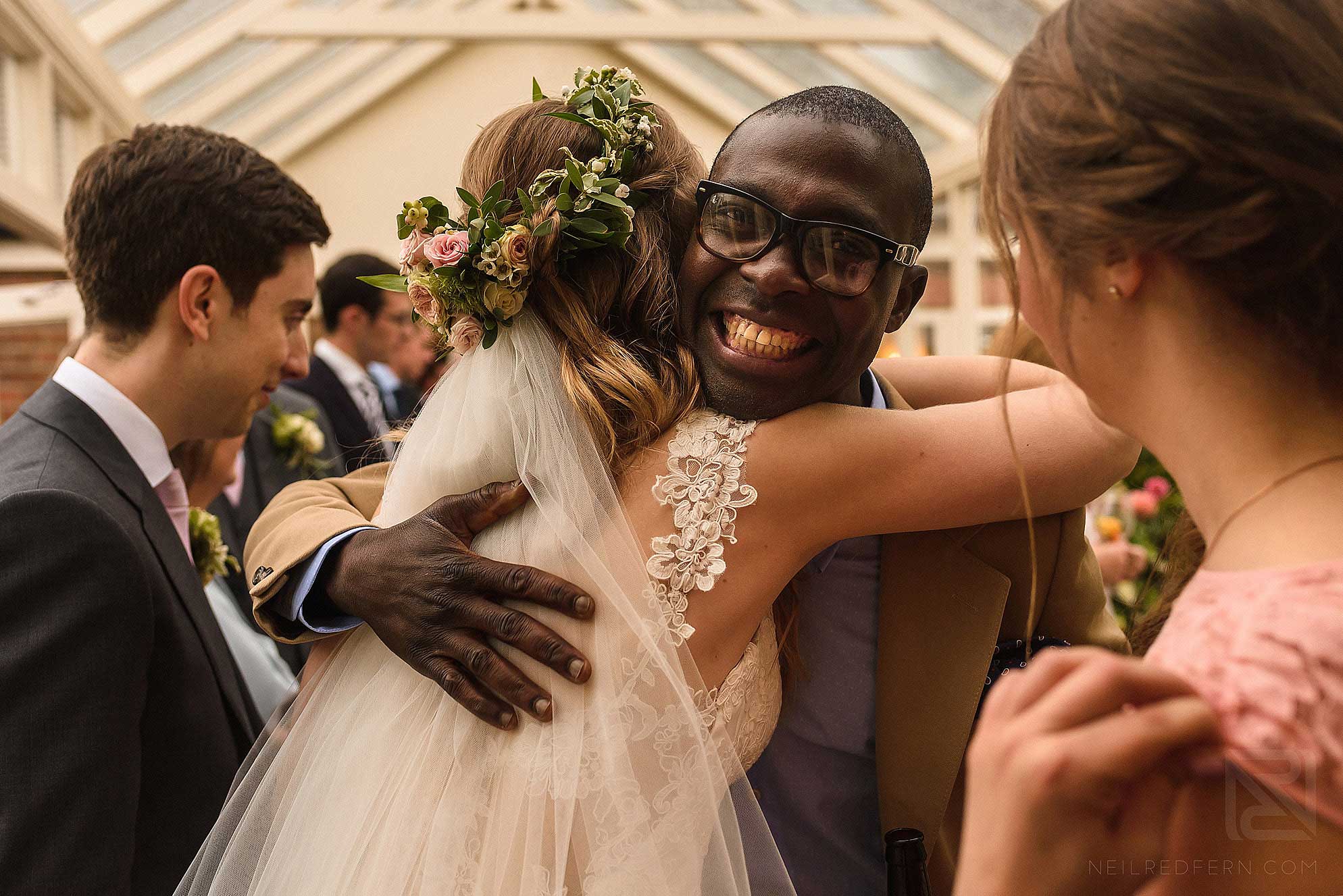 Abbeywood Estate wedding photography 19 guest hugging bride