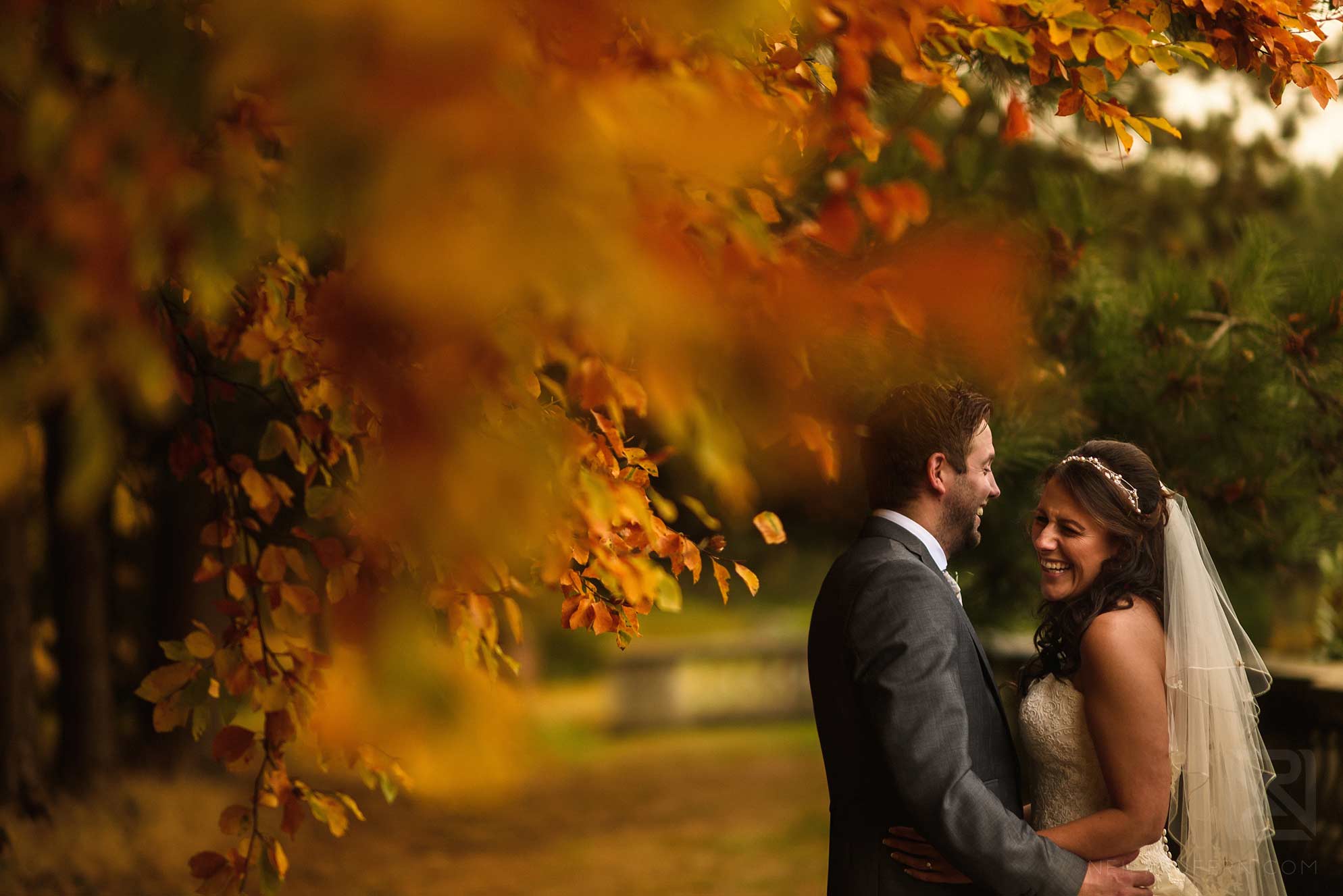 portrait of bride and groom in autumn