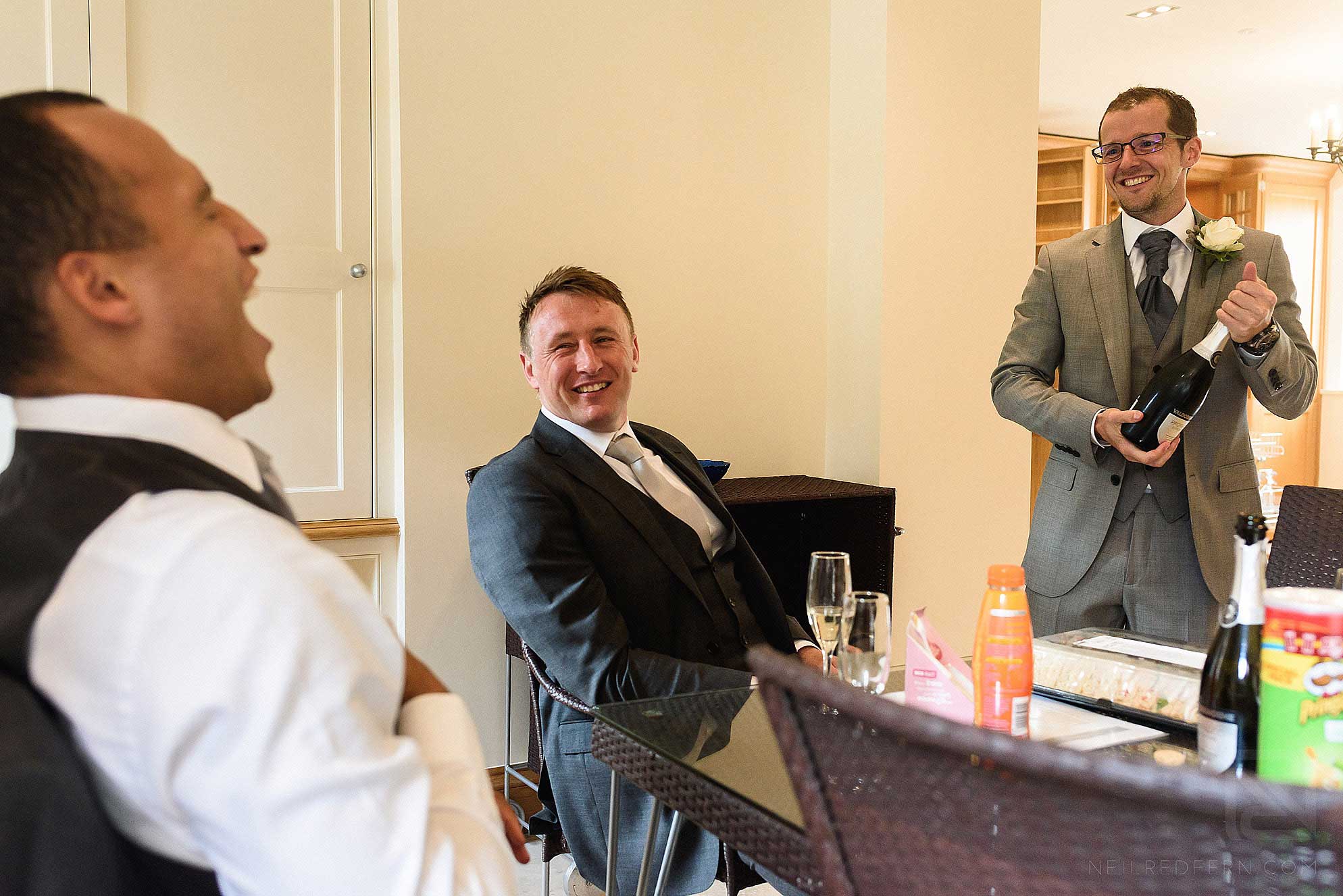 groomsmen laughing