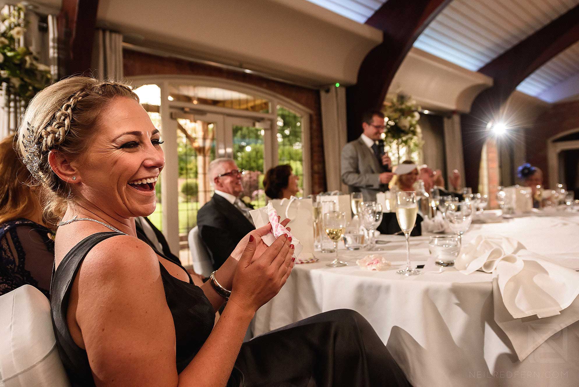 laughing guest at wedding