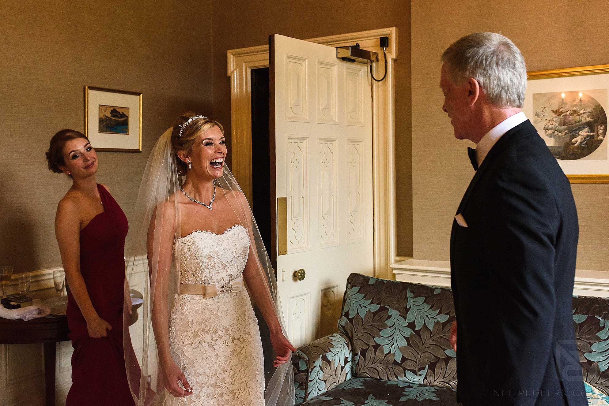 bride looking at dad and smiling
