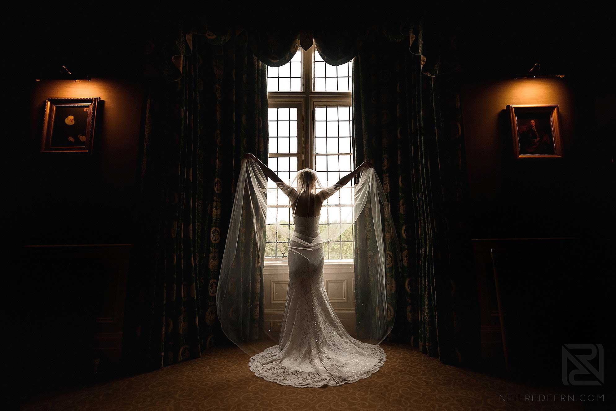 bride showing off the back of her dress