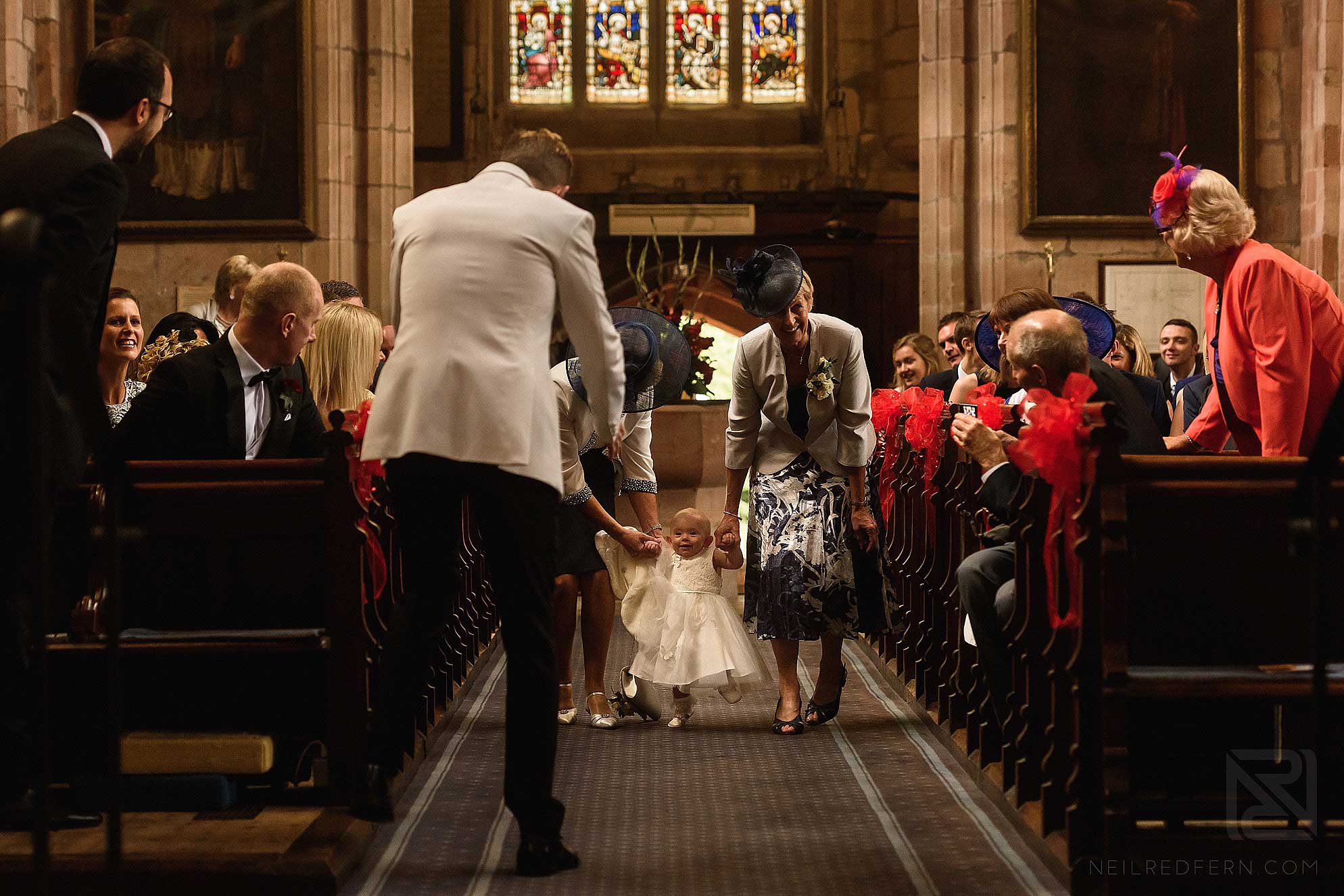 toddler walking down the aisle