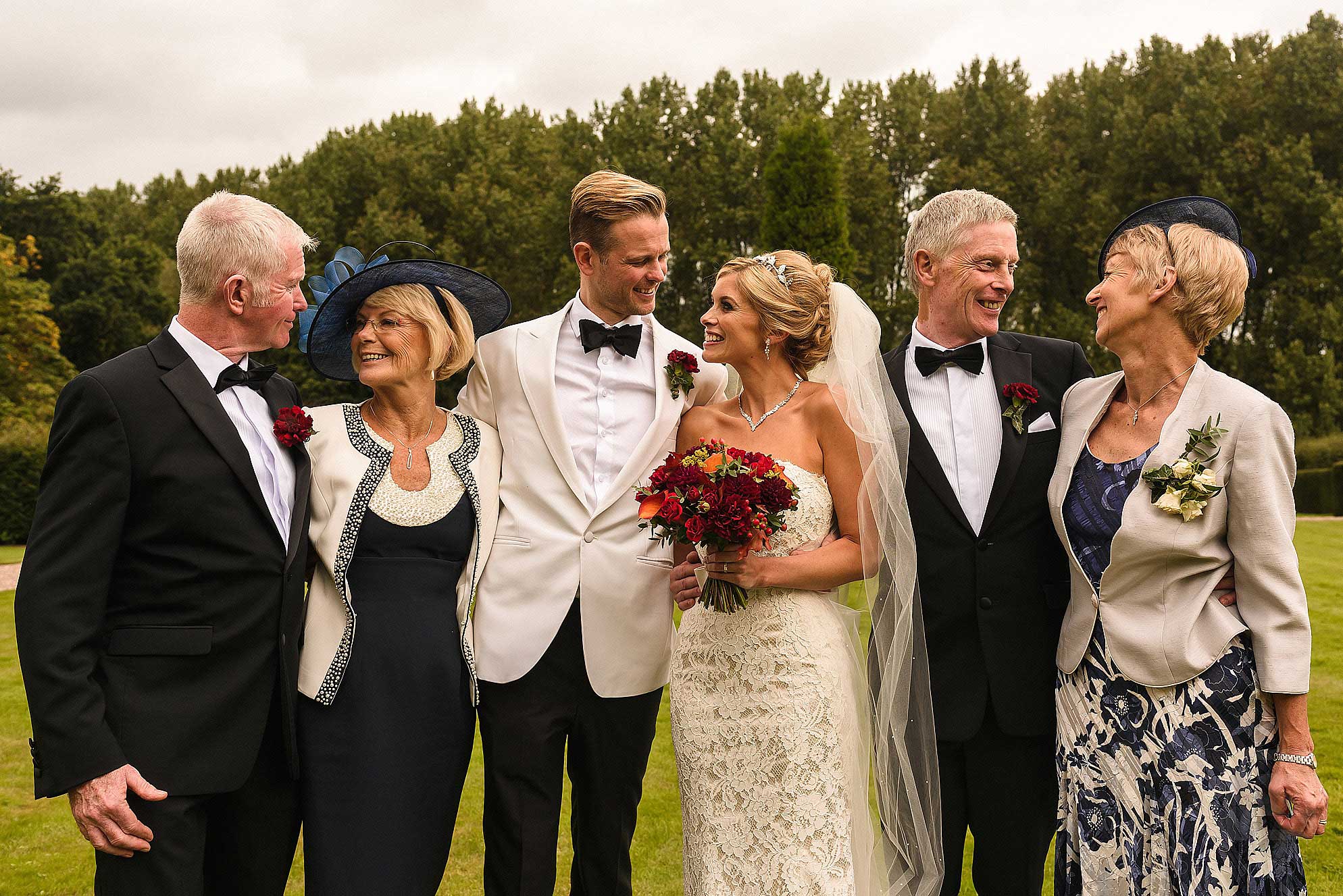 bride and groom with their parents