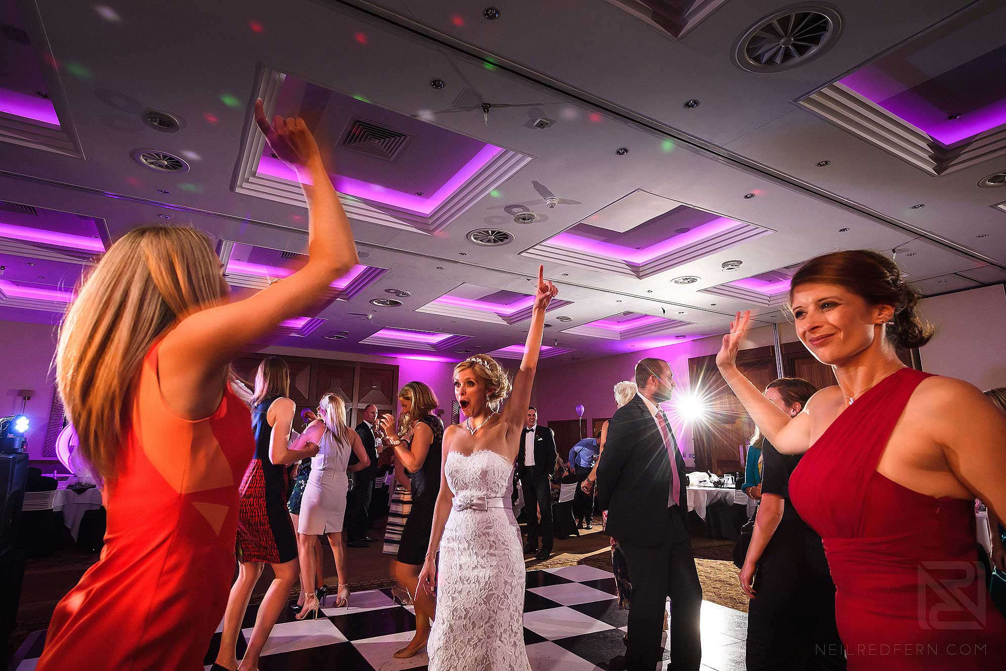 wedding guests dancing at reception