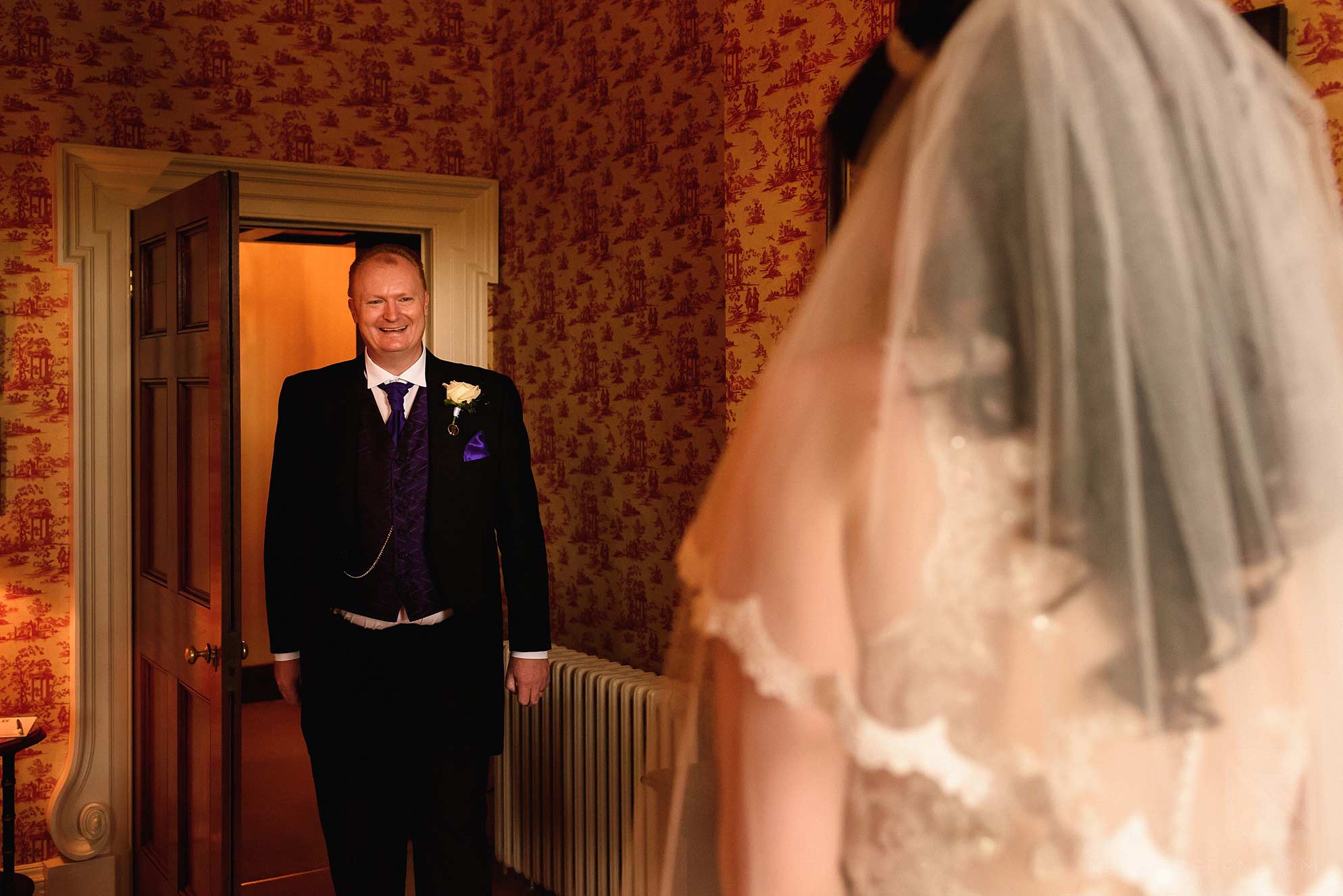 Knowsley Hall summer wedding 3 father seeing daughter in wedding dress