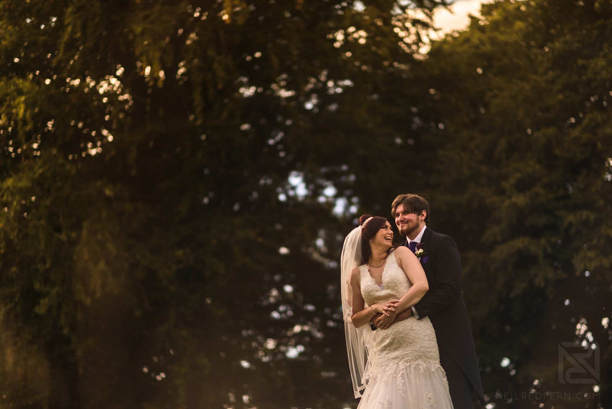 Knowsley Hall summer wedding 18 bride and groom laughing