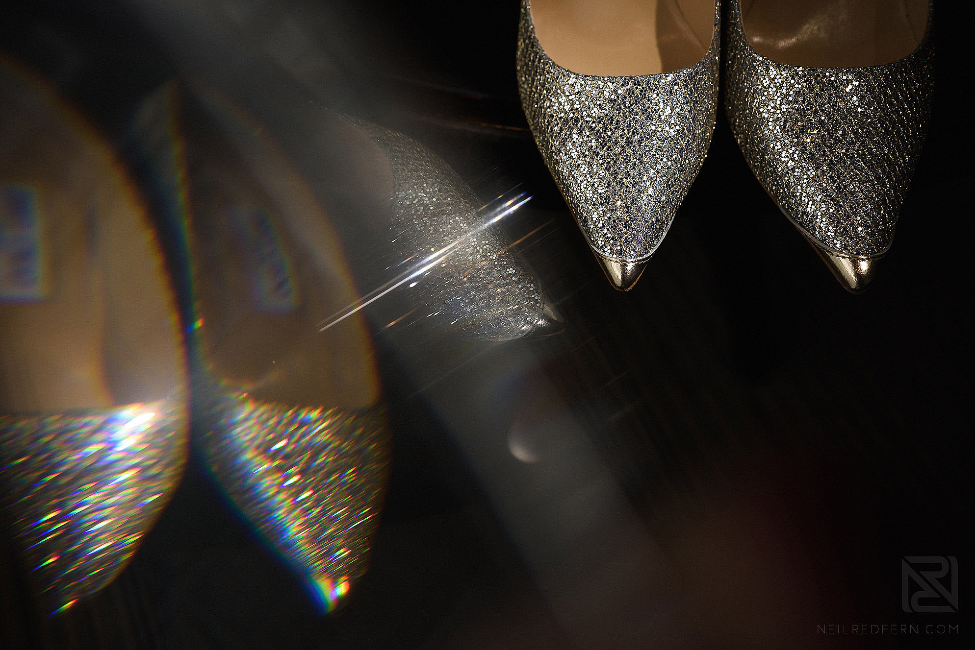 creative photograph of wedding shoes