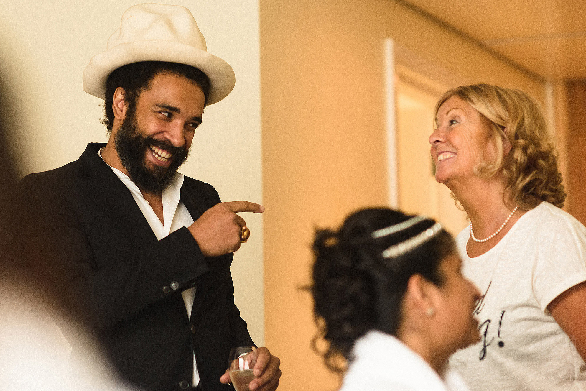 wedding guests laughing