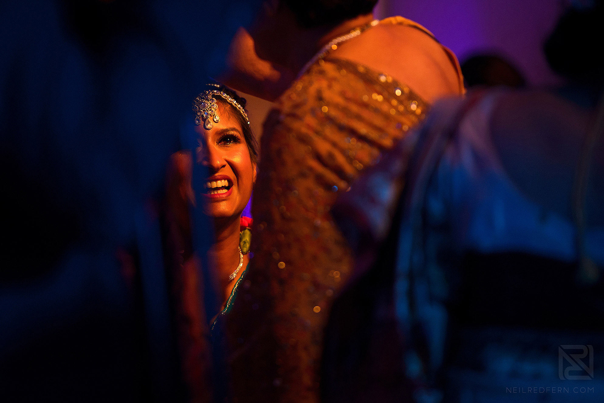 bride laughing during ceremony