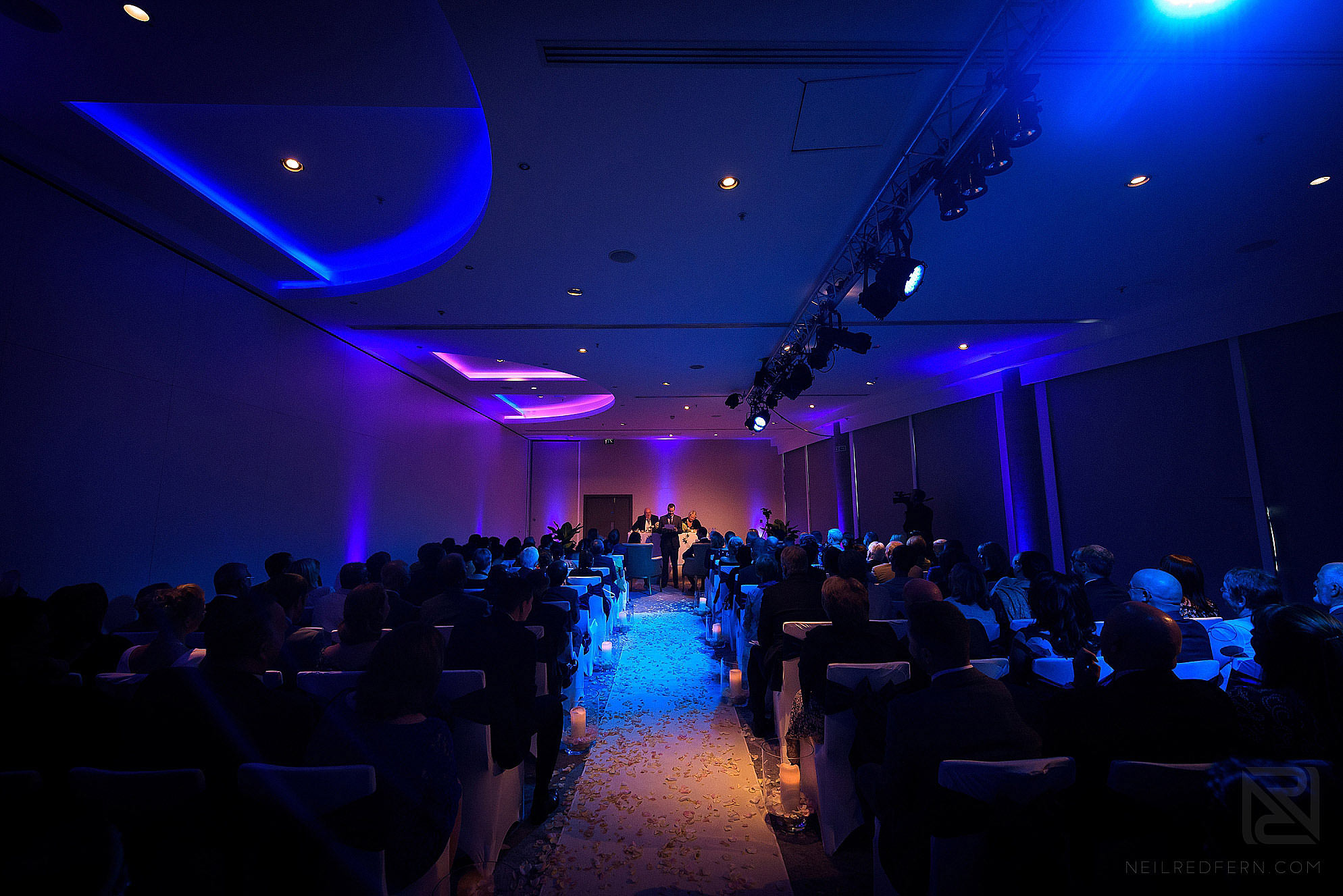 wide angle photograph of wedding ceremony at The Lowry Hotel