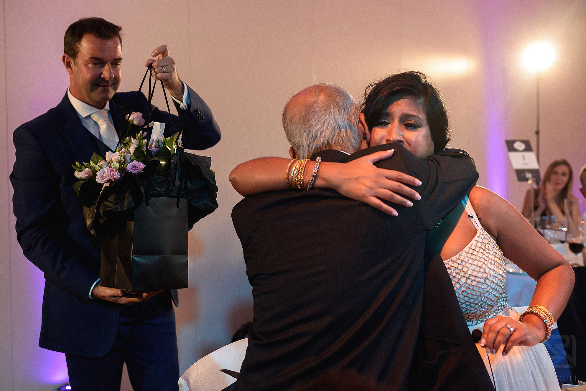 bride hugging dad at wedding