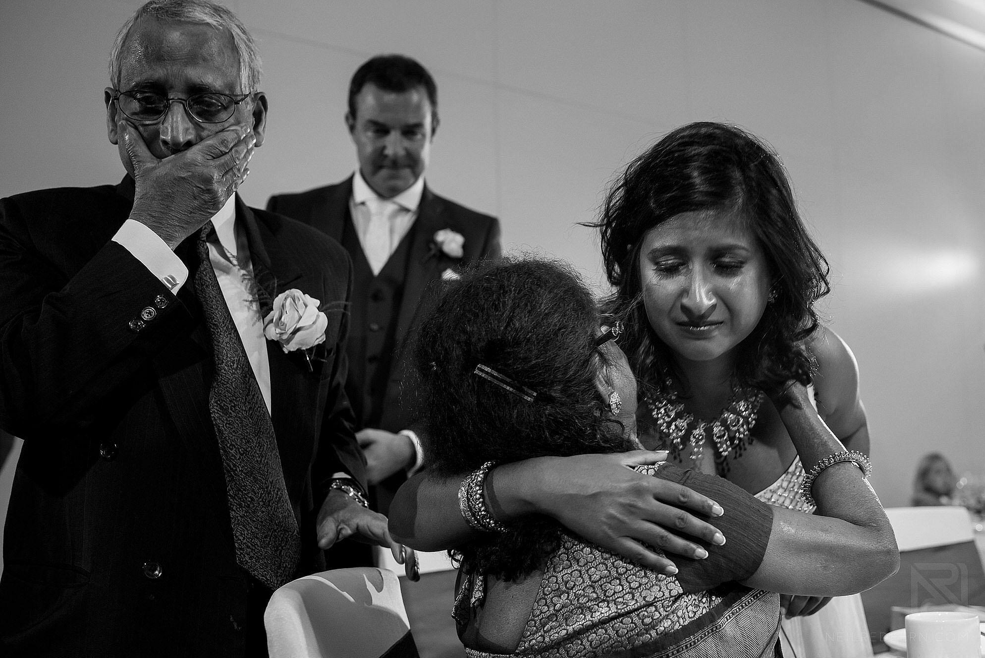 bride hugging mum during speeches