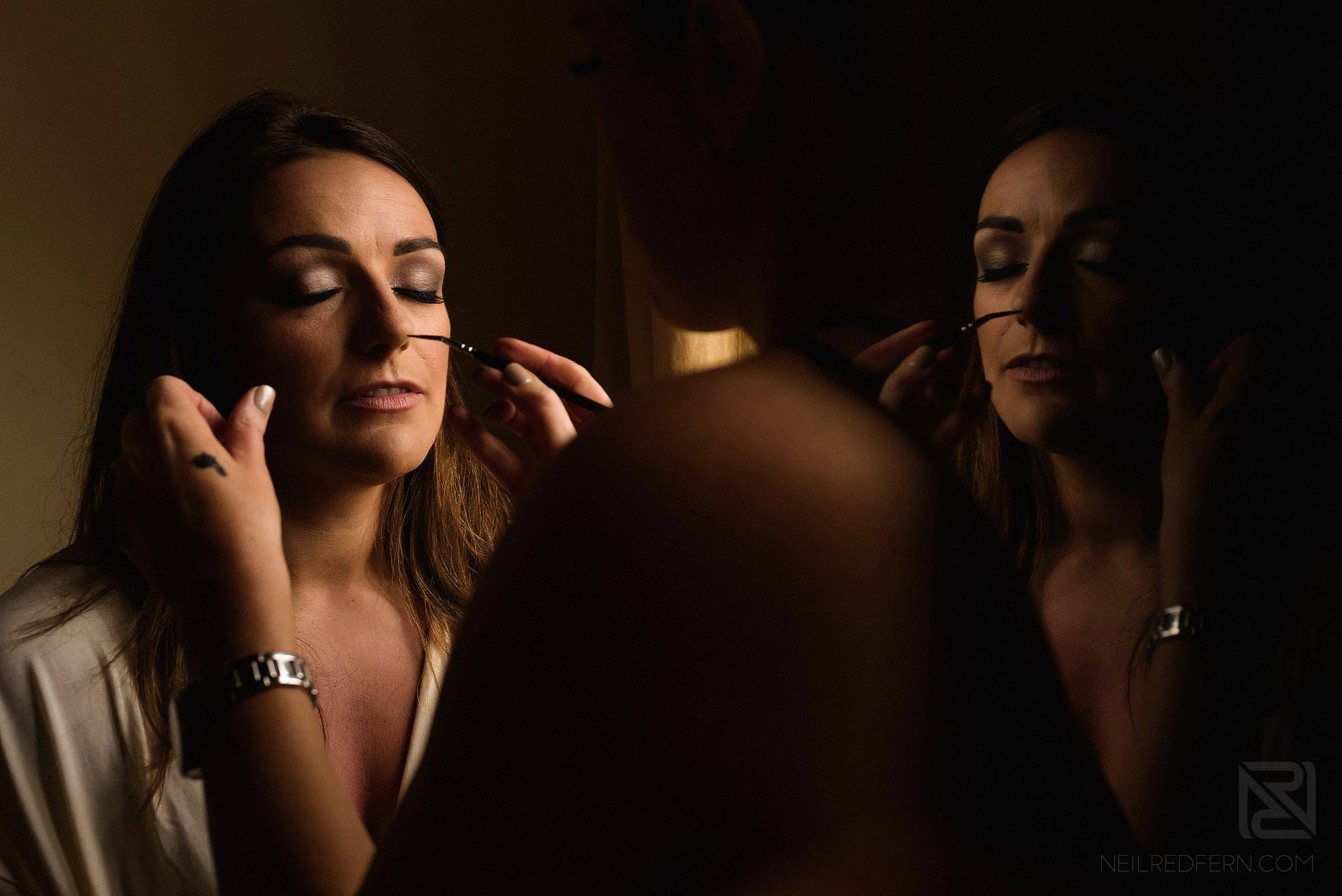 bride putting on make-up