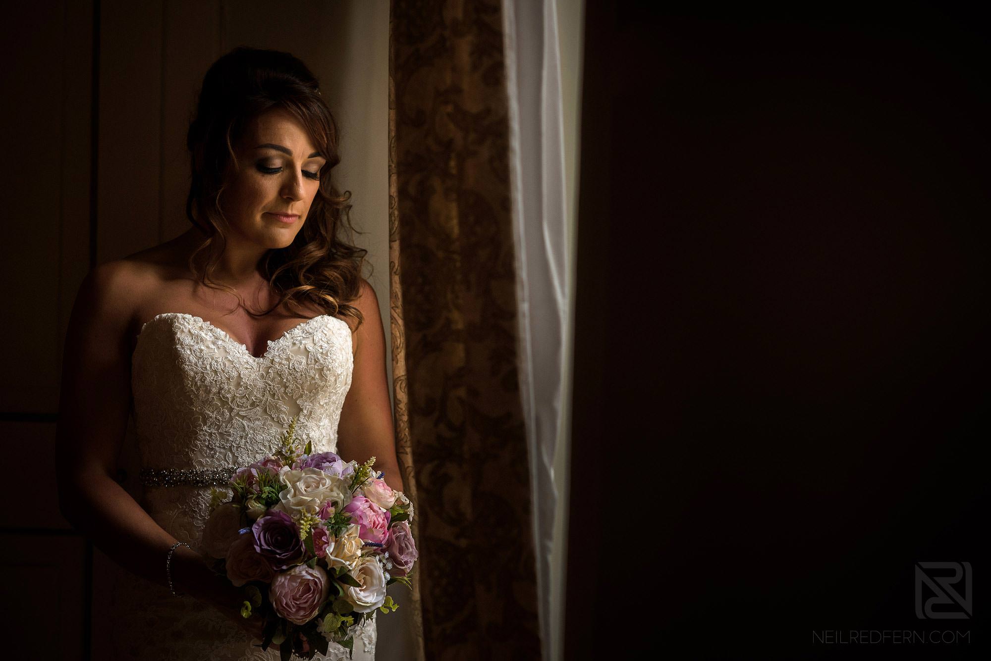 beautiful portrait of bride by window