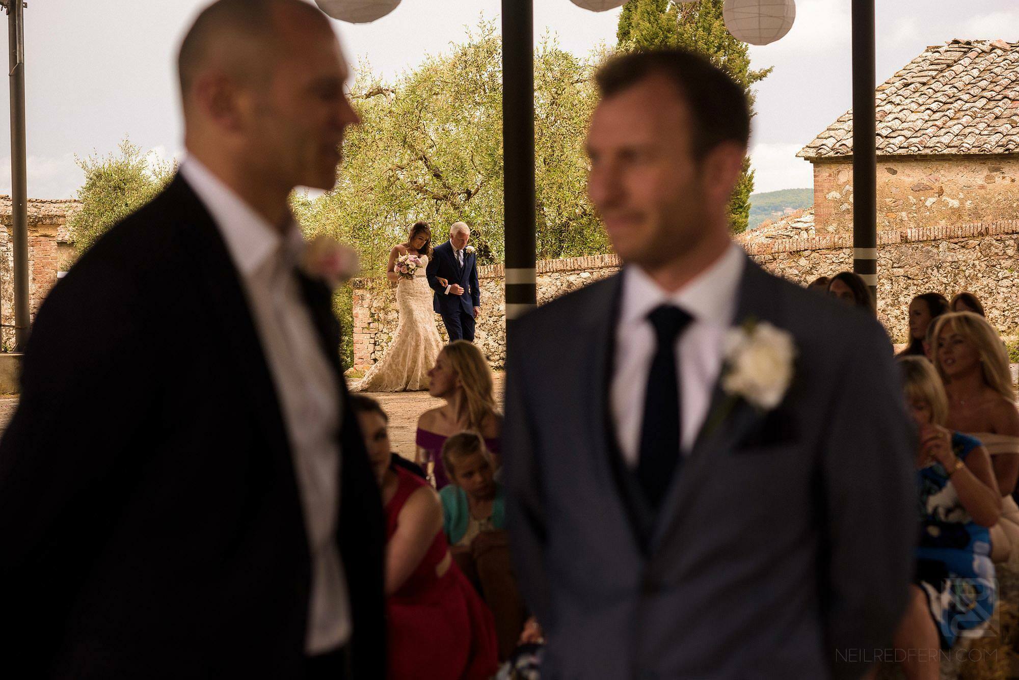 bride walking down aisle in Montestigliano