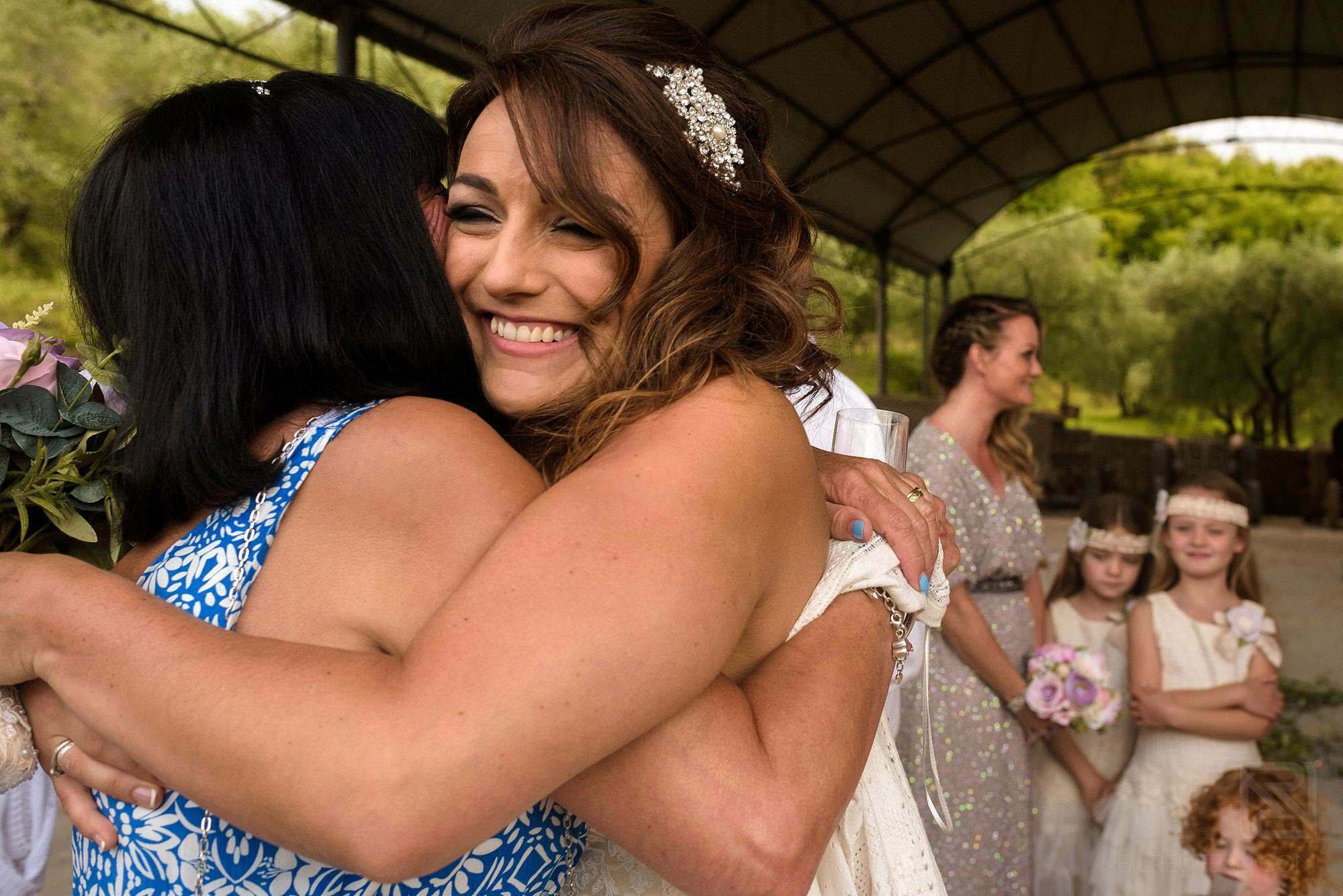 bride hugging friend
