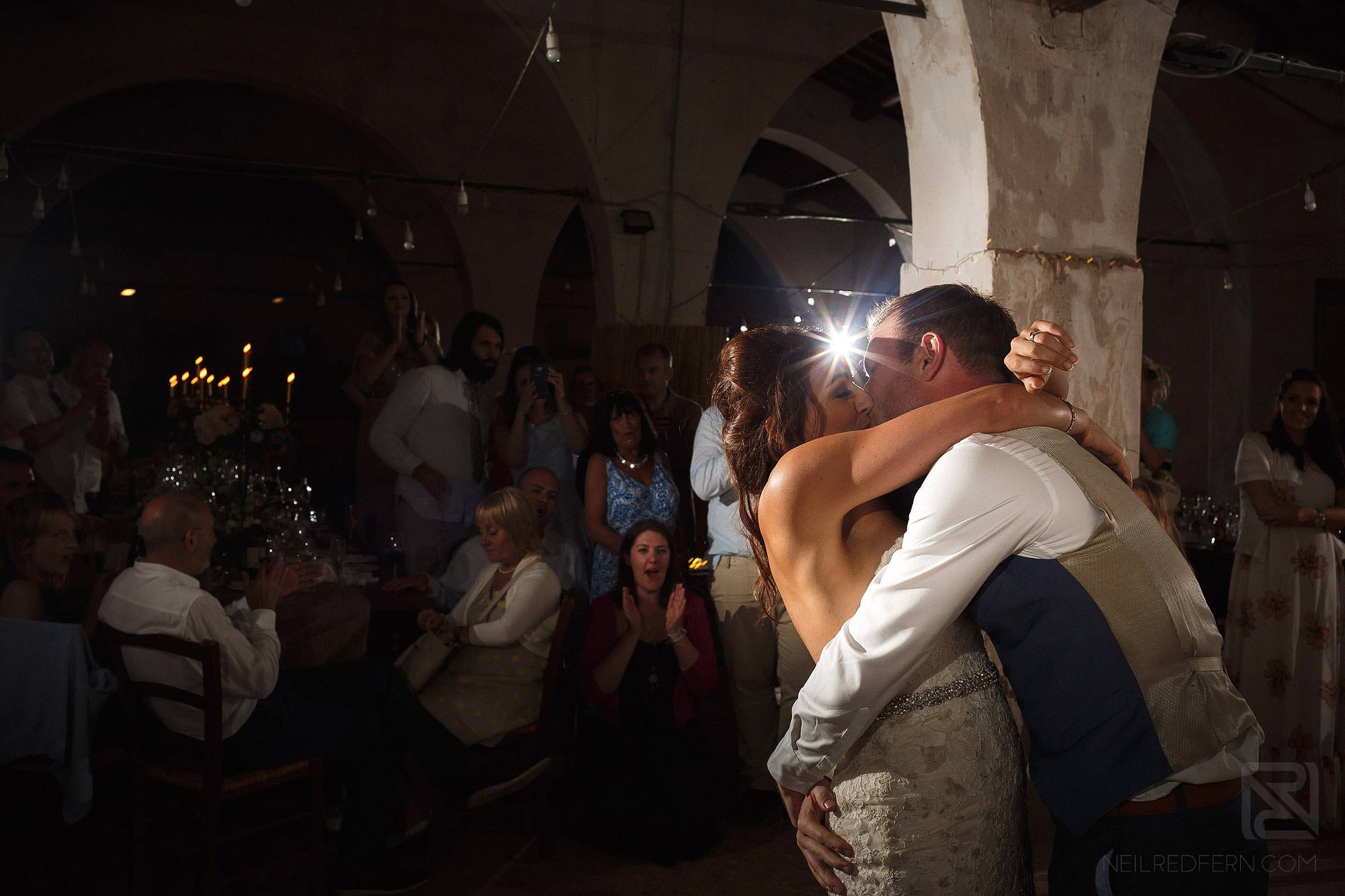 bride and groom kissing at Montestigliano wedding