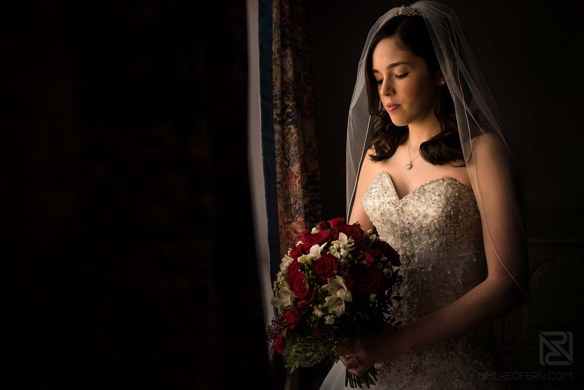 beautiful portrait of bride before leaving house