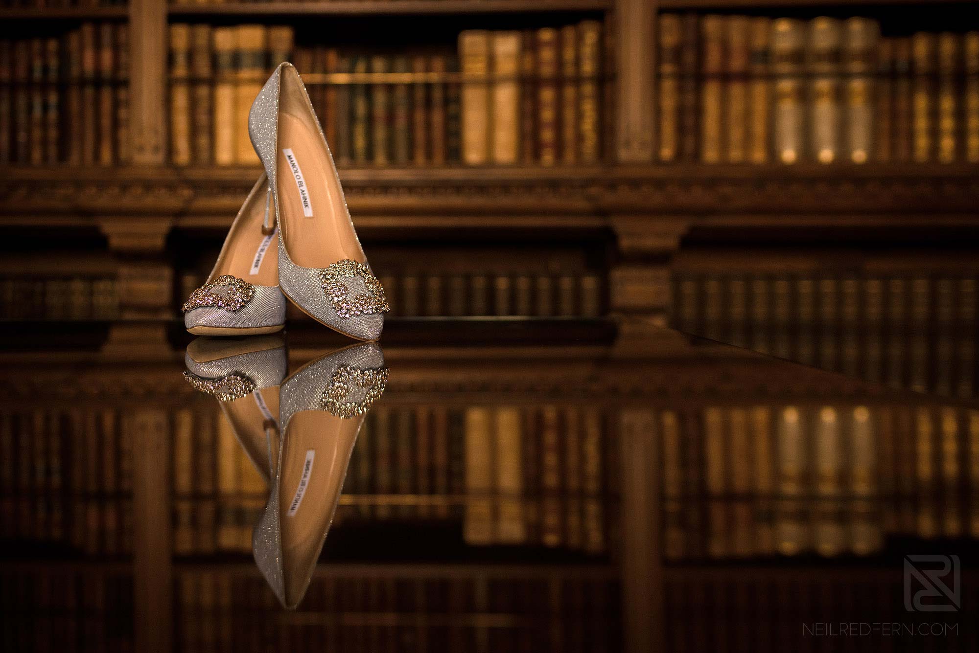 creative photograph of bride's wedding shoes 