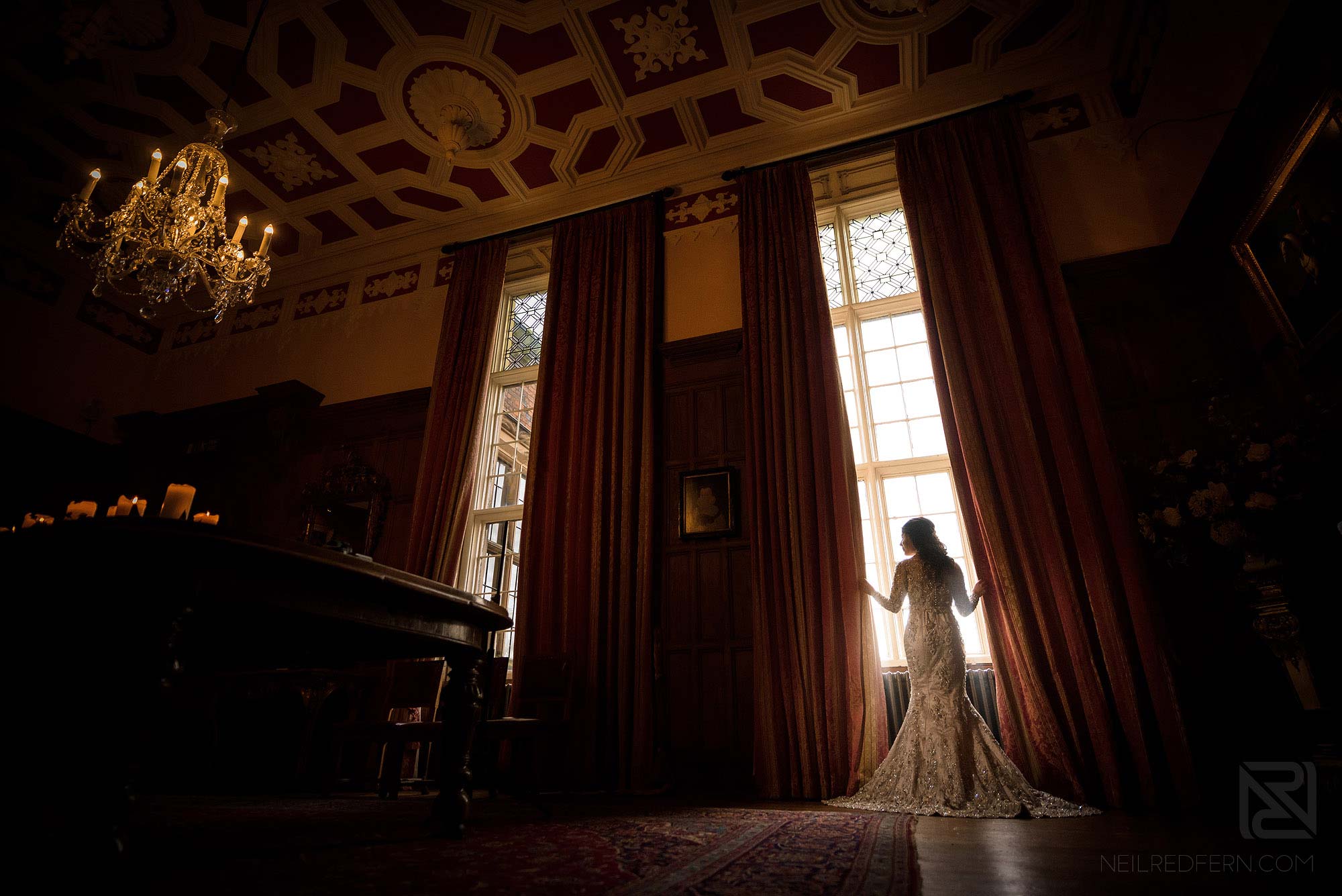 wide photograph of bride inside Arley Hall