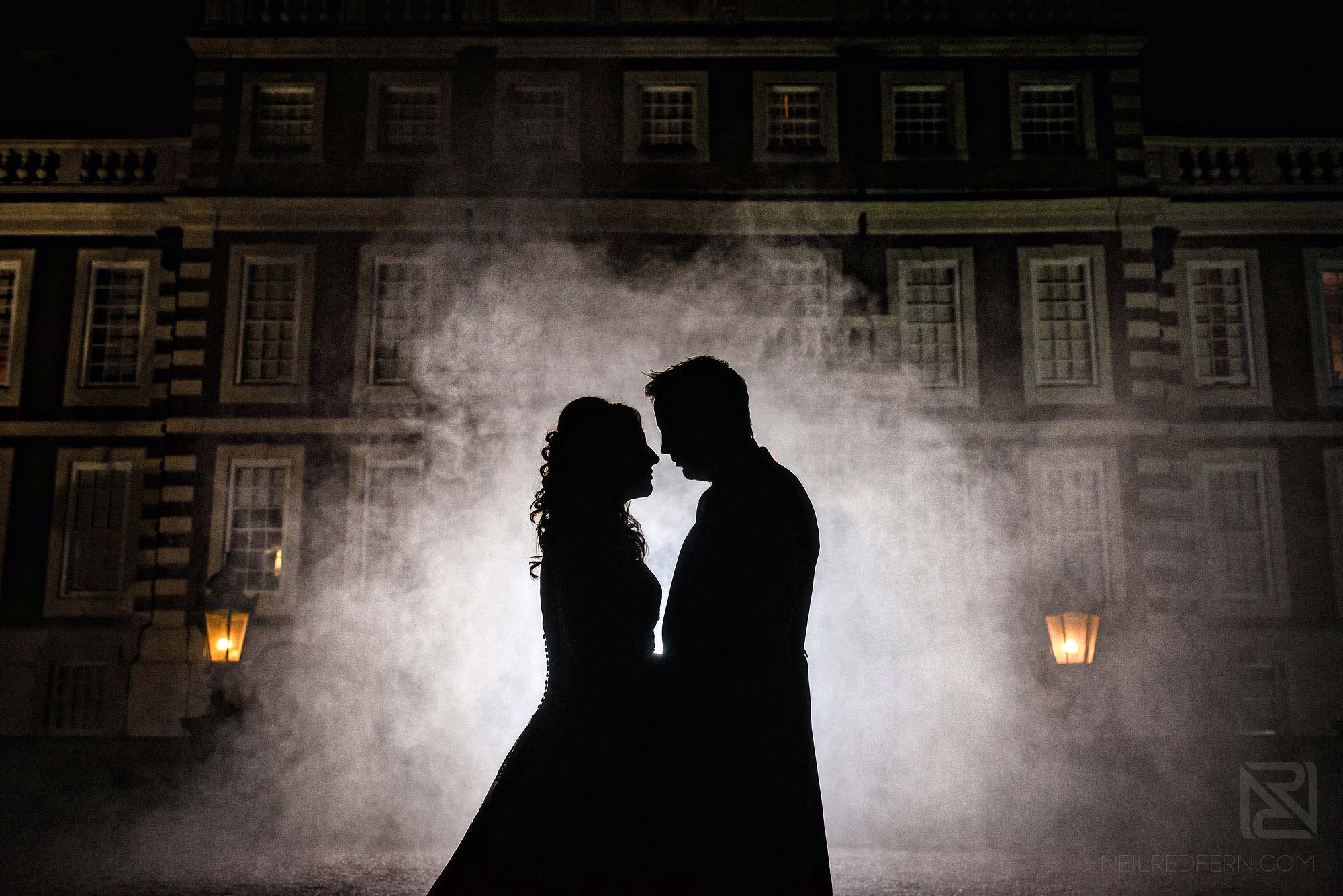 creative silhouette photograph of bride and groom outside Knowsley Hall 