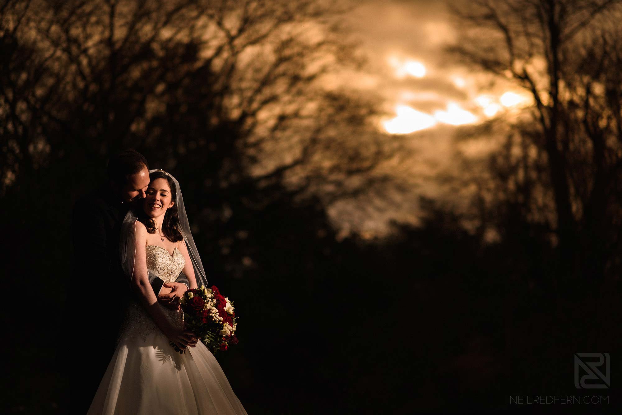 bride and groom portrait at sunset in winter