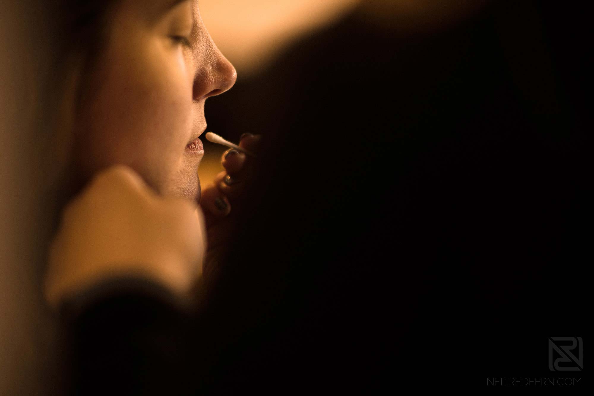 bride having lipstick put on