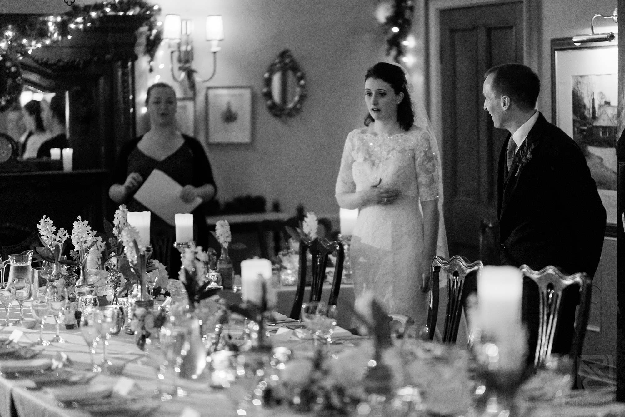 bride looking shocked at wedding breakfast room at Broadoaks Country House