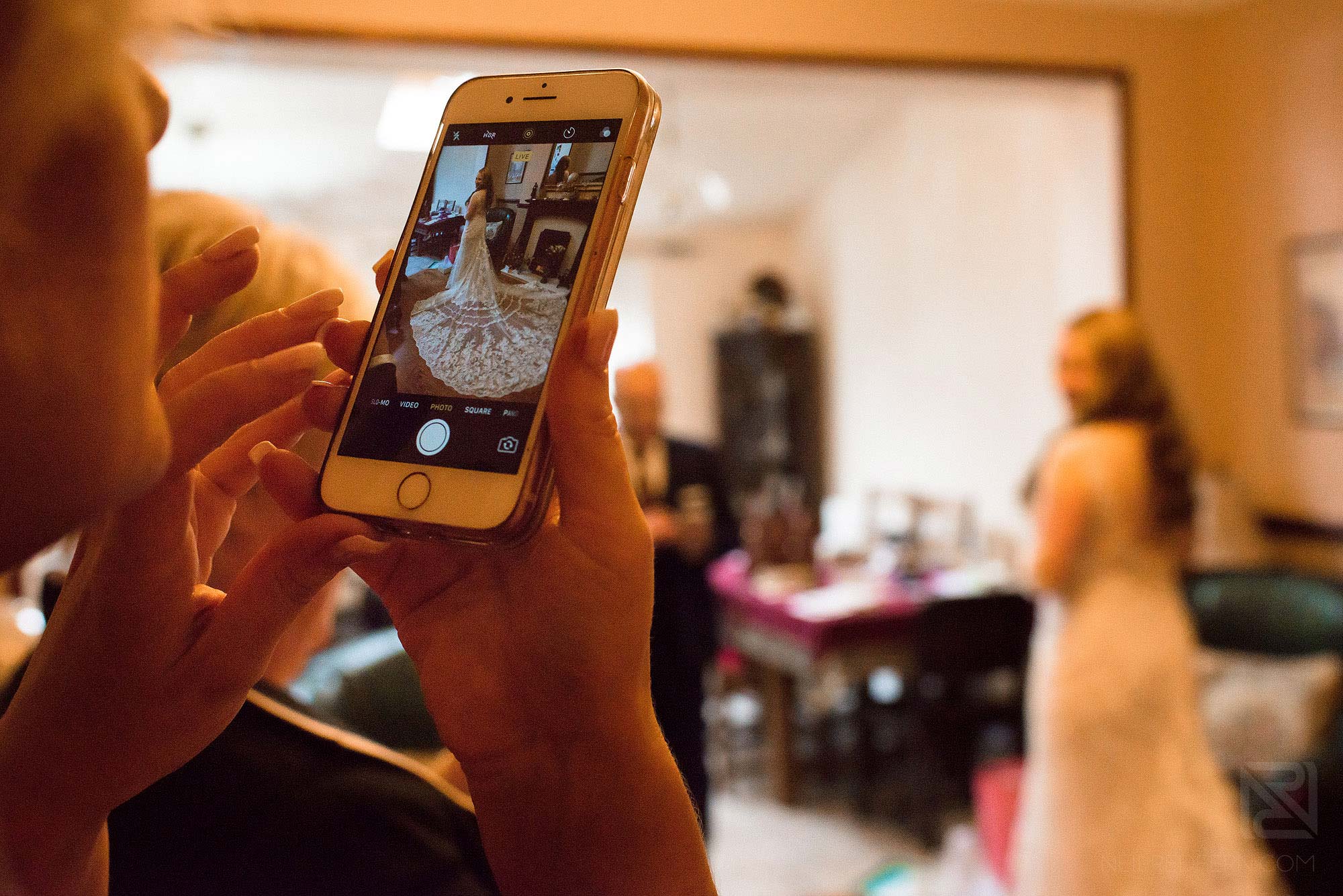 Manchester Museum wedding photography 12 bride's mother taking photograph on phone