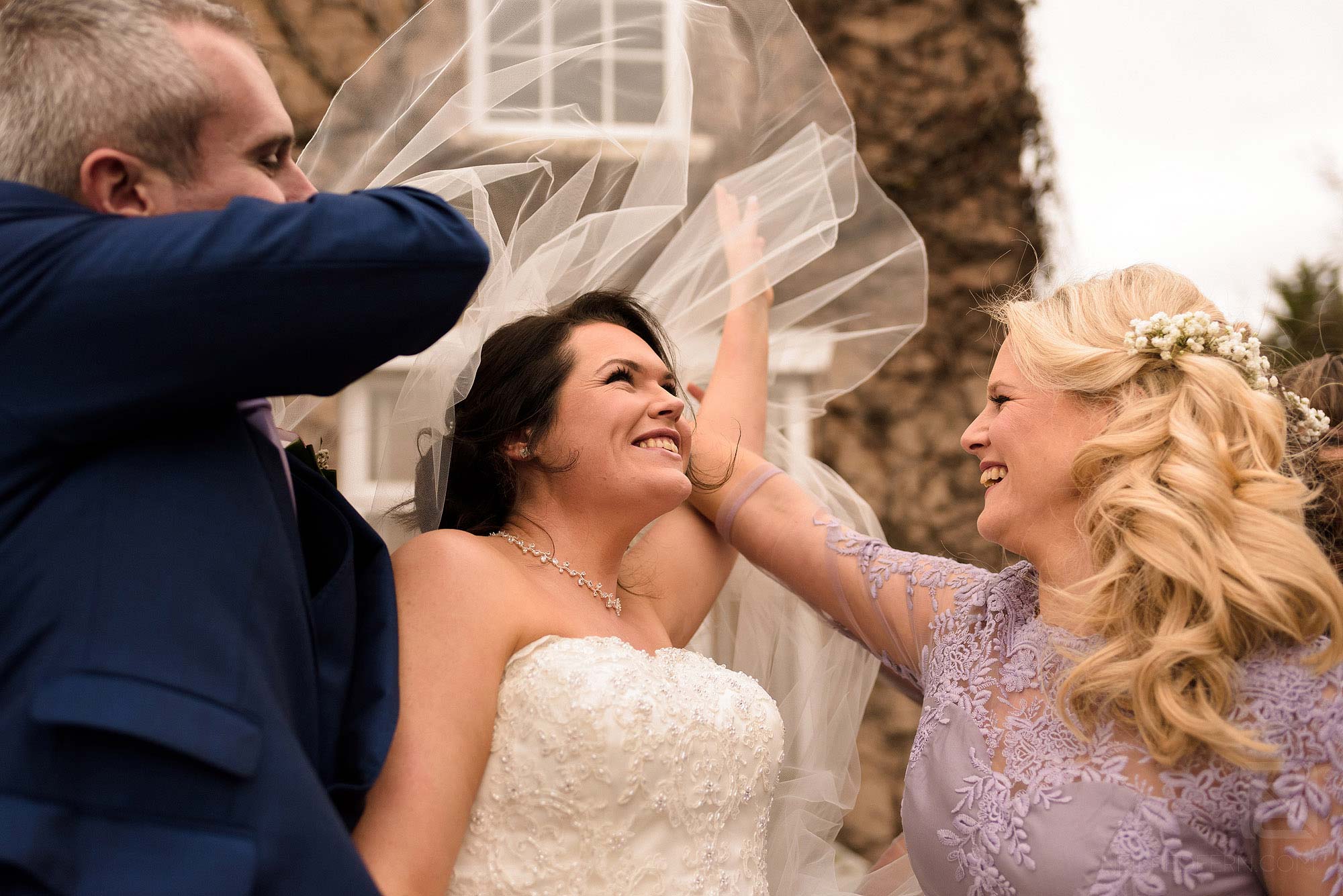 bride's veil blowing in the wind