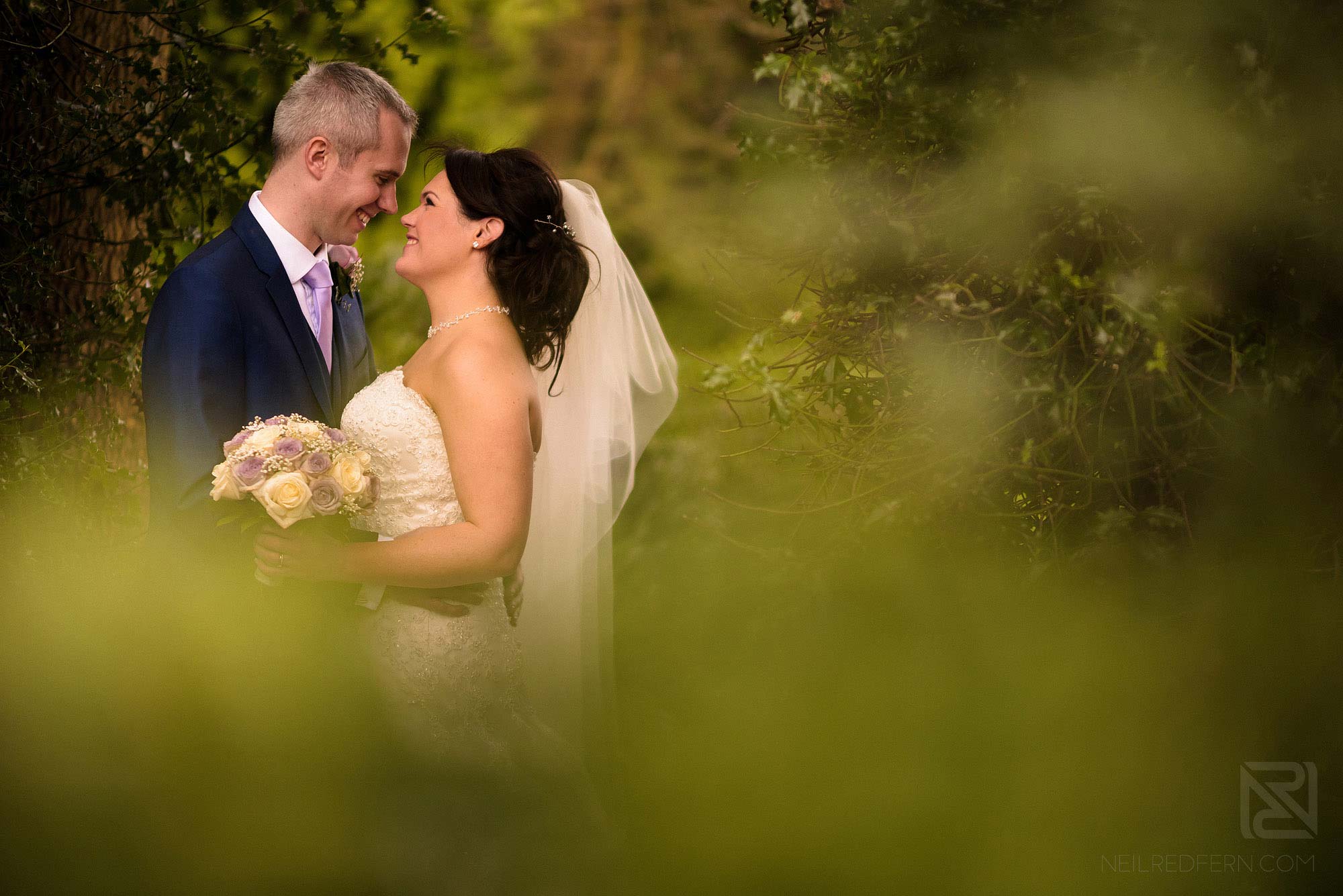 romantic portrait photograph of bride and groom at Rowton Hall