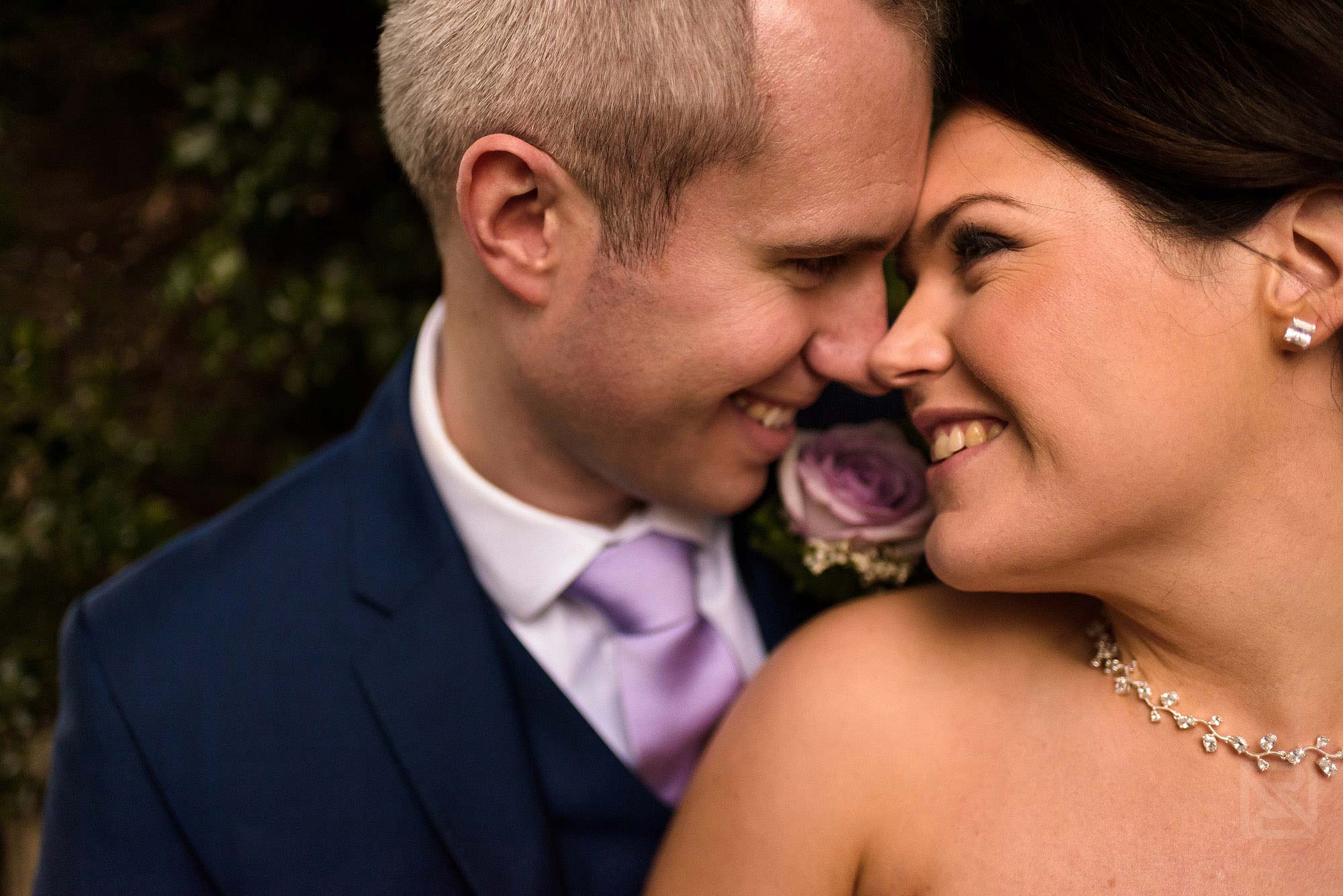close up romantic photograph of bride and groom together at Rowton Hall