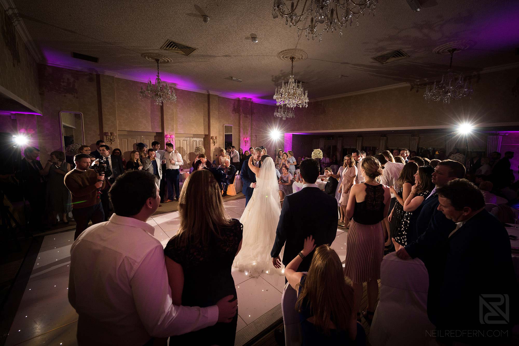 wide angle photograph of first dance at Rowton Hall wedding
