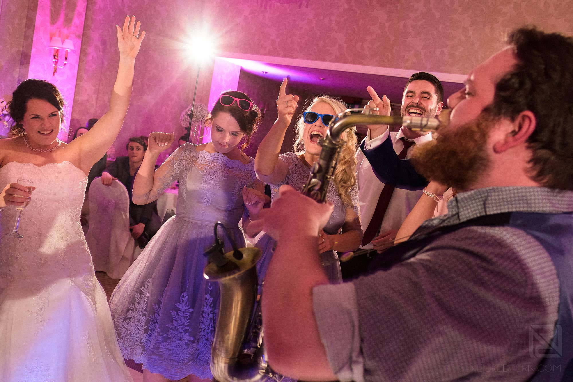 The Rush wedding band playing at Rowton Hall wedding