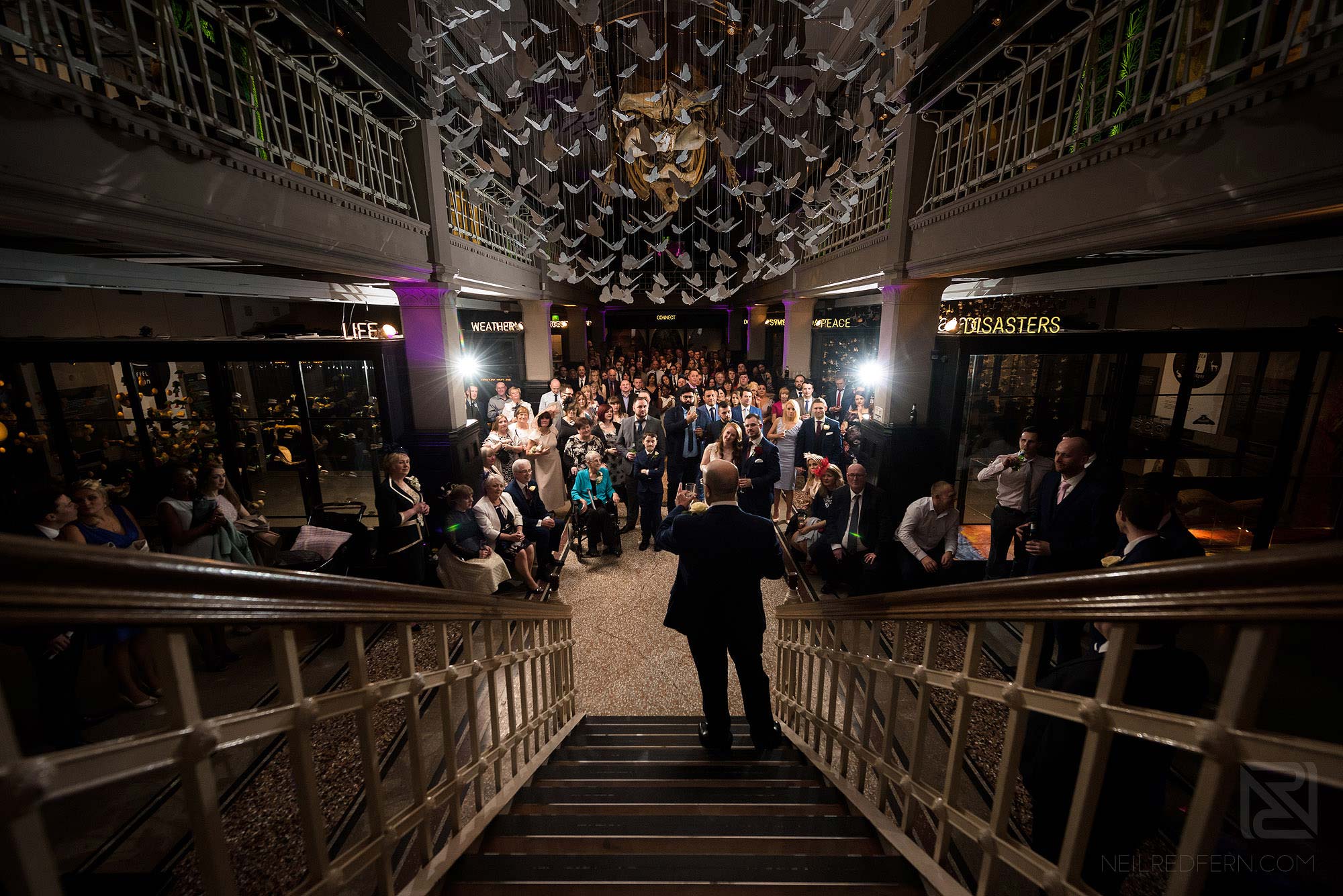 Manchester Museum wedding photography 23 wide angle photograph of speeches at Manchester Museum wedding