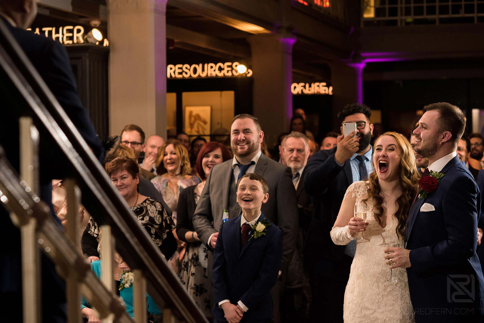 Manchester Museum wedding photography 24 laughter during wedding speeches at Manchester Museum