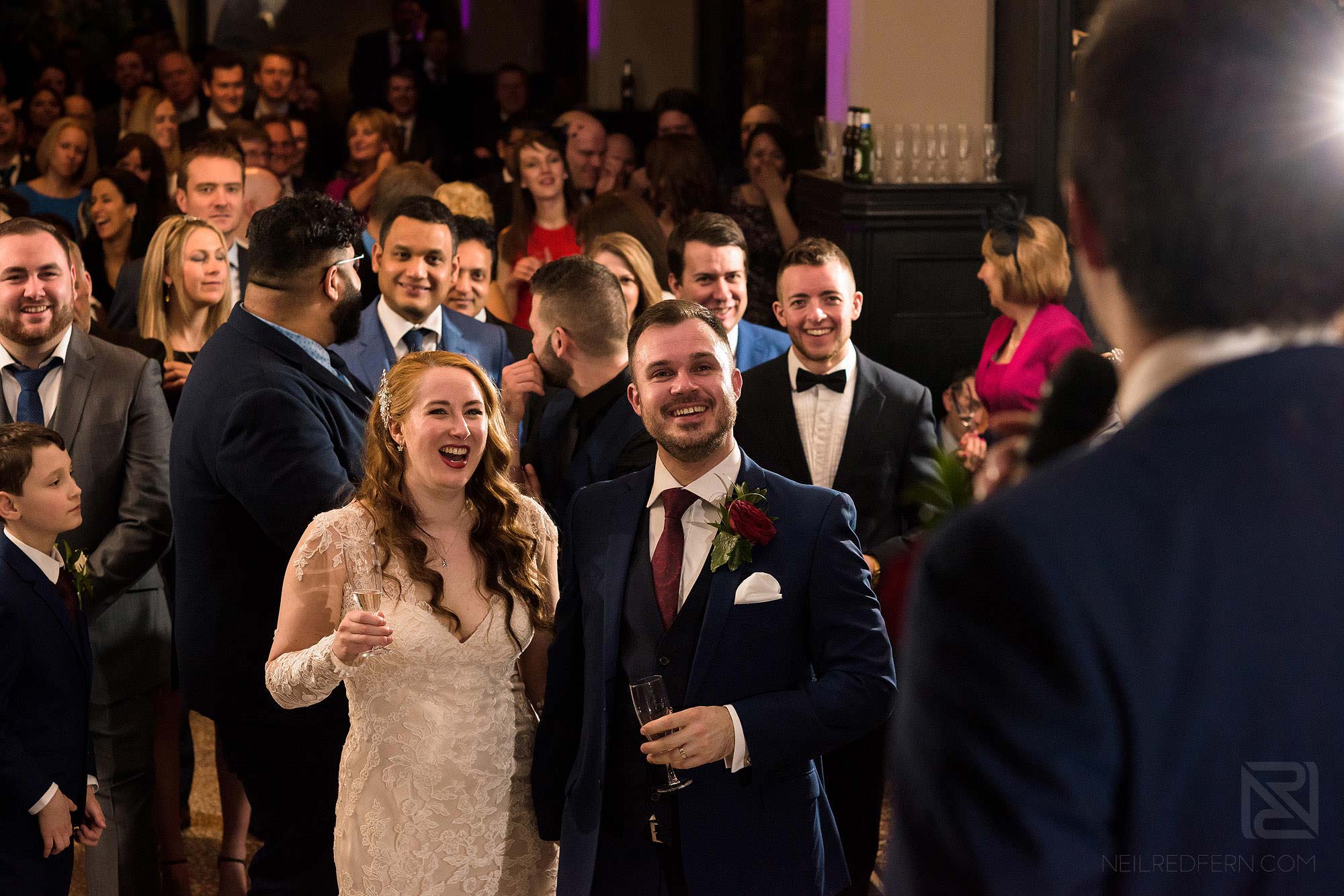 Manchester Museum wedding photography 27 wedding guests laughing during best man's speech