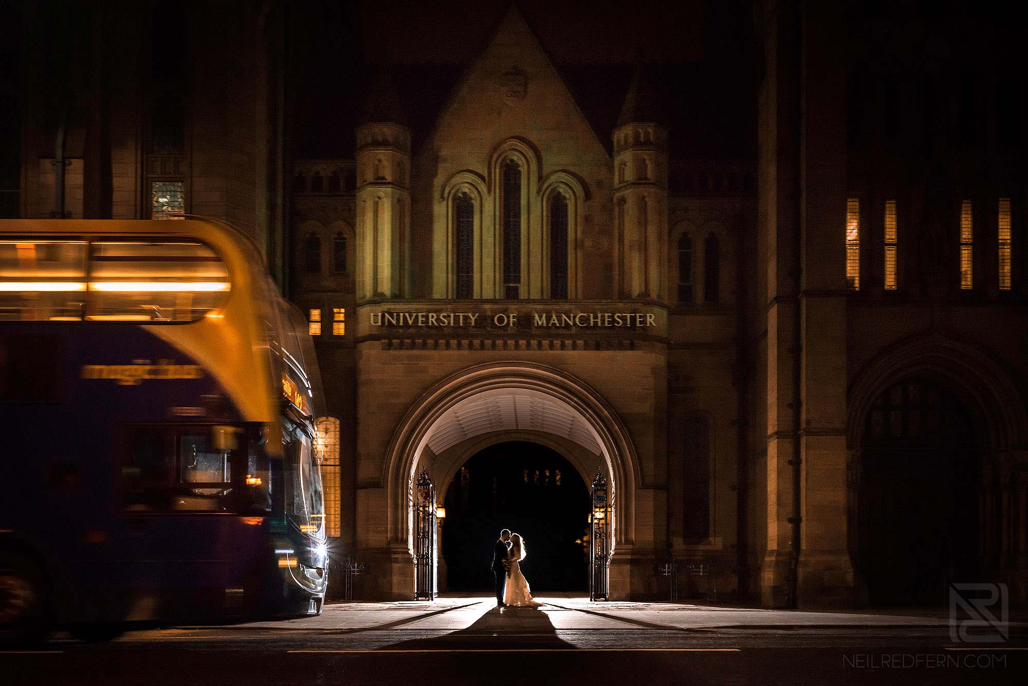 Manchester Museum wedding photography 36 bride and groom outside Manchester Museum at night