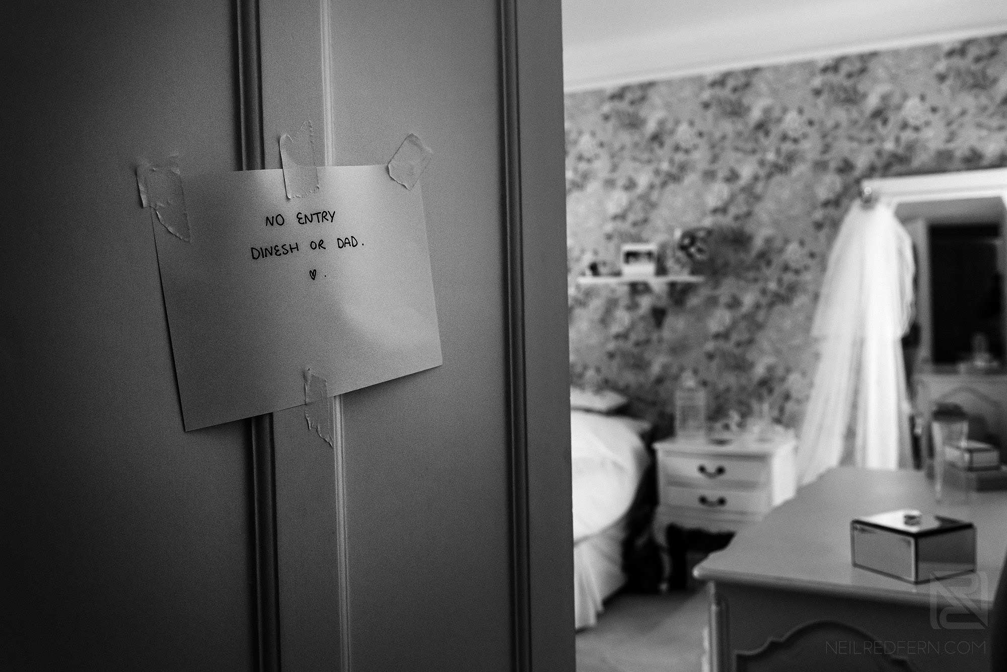funny note on bride's bedroom door